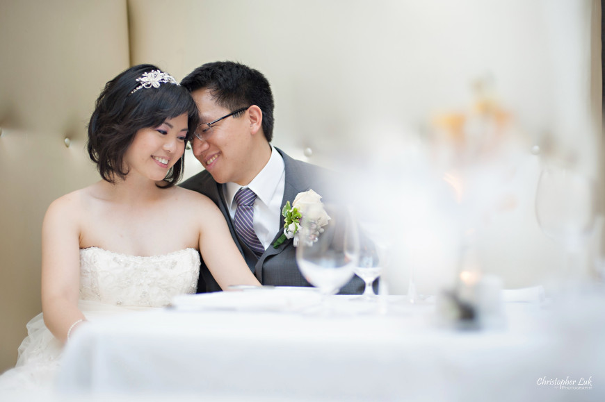 Christopher Luk 2013 - Grace and Victor's Wedding - Sassafraz Restaurant Yorkville Royal Ontario Museum Downtown Toronto Event Photographer - Bride and Groom Creative Natural Relaxed Portrait Session Candid Photojournalistic Sitting in Booth Hug