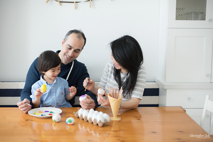 Christopher Luk 2015 - Toronto Family Toddler Winter Spring Indoor Home Session - Mom Dad Toddler Son Boy Blue Shirt Fashion White Kitchen Bench Chairs Wood Table Children Lifestyle Egg Painting Fun Activity