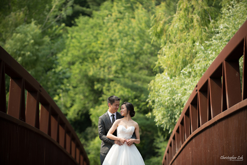 Christopher Luk 2015 - Karen and Scott's Wedding - Miller Lash House University Toronto Scarborough UTSC Outdoor Summer Ceremony Reception - Bride Groom Photojournalistic Candid Natural Relaxed Hug Bridge