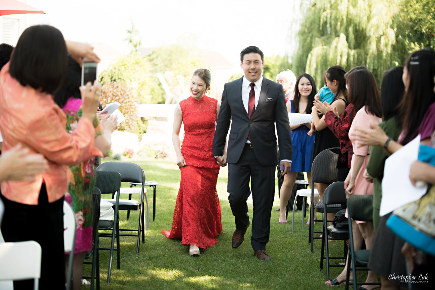 Christopher Luk 2015 - Vannessa and Daniel's Brampton Summer Outdoor Backyard Tea Ceremony Family Wedding Engagement Party Celebration - Bride Groom Navy Blue Suit Asian Red Dress Walking Down the Aisle Ceremony Processional Candid Photojournalistic