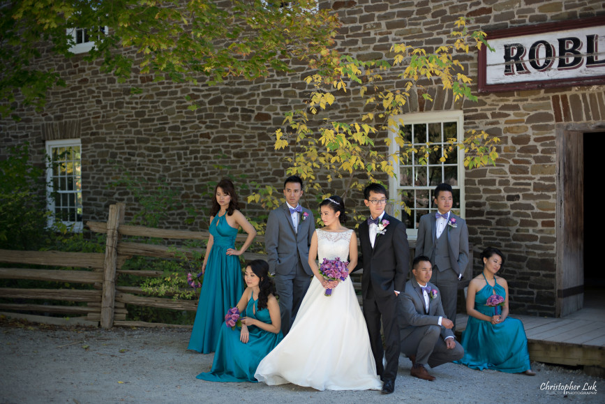 Fall Autumn Wedding Creative Relaxed Portrait Session Photojournalistic Candid Natural Posed Black Creek Pioneer Village Bride Bridesmaids Floral Bouquets Groomsmen Old Mill Entrance Bridal Party Group