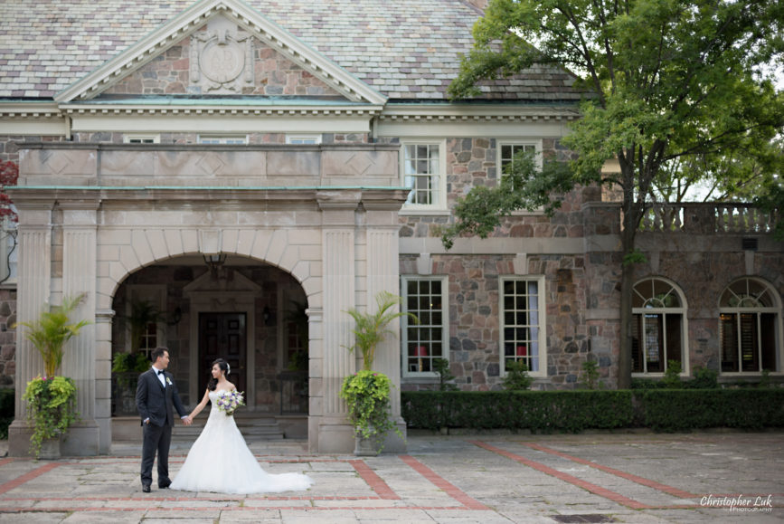 Christopher Luk (Toronto Wedding Photographer): Christine and Jonathan's Wedding - Graydon Hall Manor Toronto Foodie Summer Outdoor Garden Ceremony Patio Terrace Tent Dinner Reception Evening Mansion Estate Front Exterior Bride Groom Portrait Holding Hands Facade