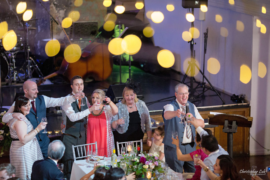 Christopher Luk (Toronto Wedding Photographer): Berkeley Church Vintage Rustic Ceremony Candlelight Dinner Reception Pinterest Worthy Details Candid Natural Photojournalistic Irish Ireland Family Traditional Singer Singing Song Cheers Raise a Glass Toast