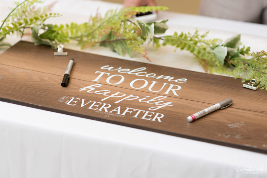 Christopher Luk - Toronto Wedding Photographer - Markham Chinese Baptist Church MCBC Christian Ceremony - Natural Candid Photojournalistic Sign In Reception Table Decor Signing Wood Wooden Board Calligraphy Welcome to Our Happily Ever After