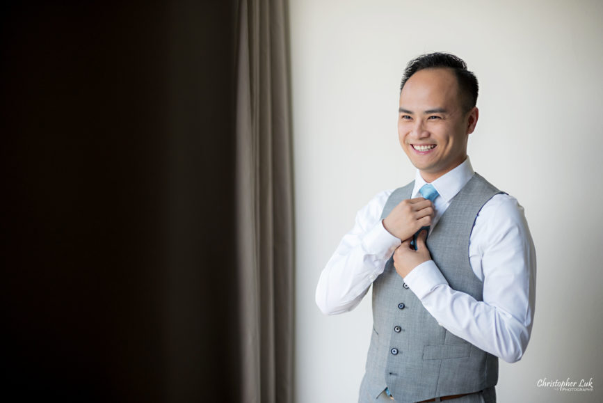 Christopher Luk - Toronto Wedding Lifestyle Event Photographer - Photojournalistic Natural Candid Hilton Suites Markham Groom Getting Ready Indochino Suit Grey Vest Tie