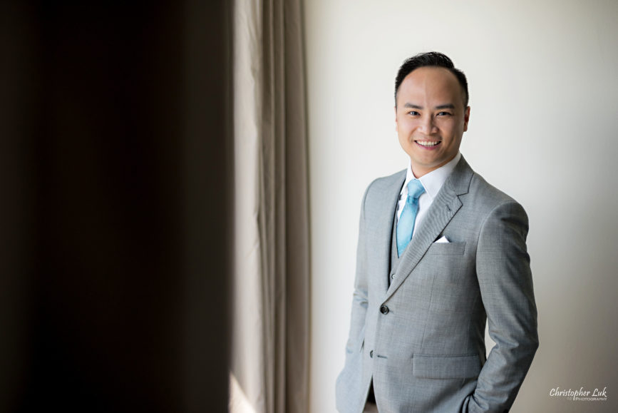 Christopher Luk - Toronto Wedding Lifestyle Event Photographer - Photojournalistic Natural Candid Hilton Suites Markham Groom Getting Ready Indochino Suit Grey Vest Blue Tie Portrait