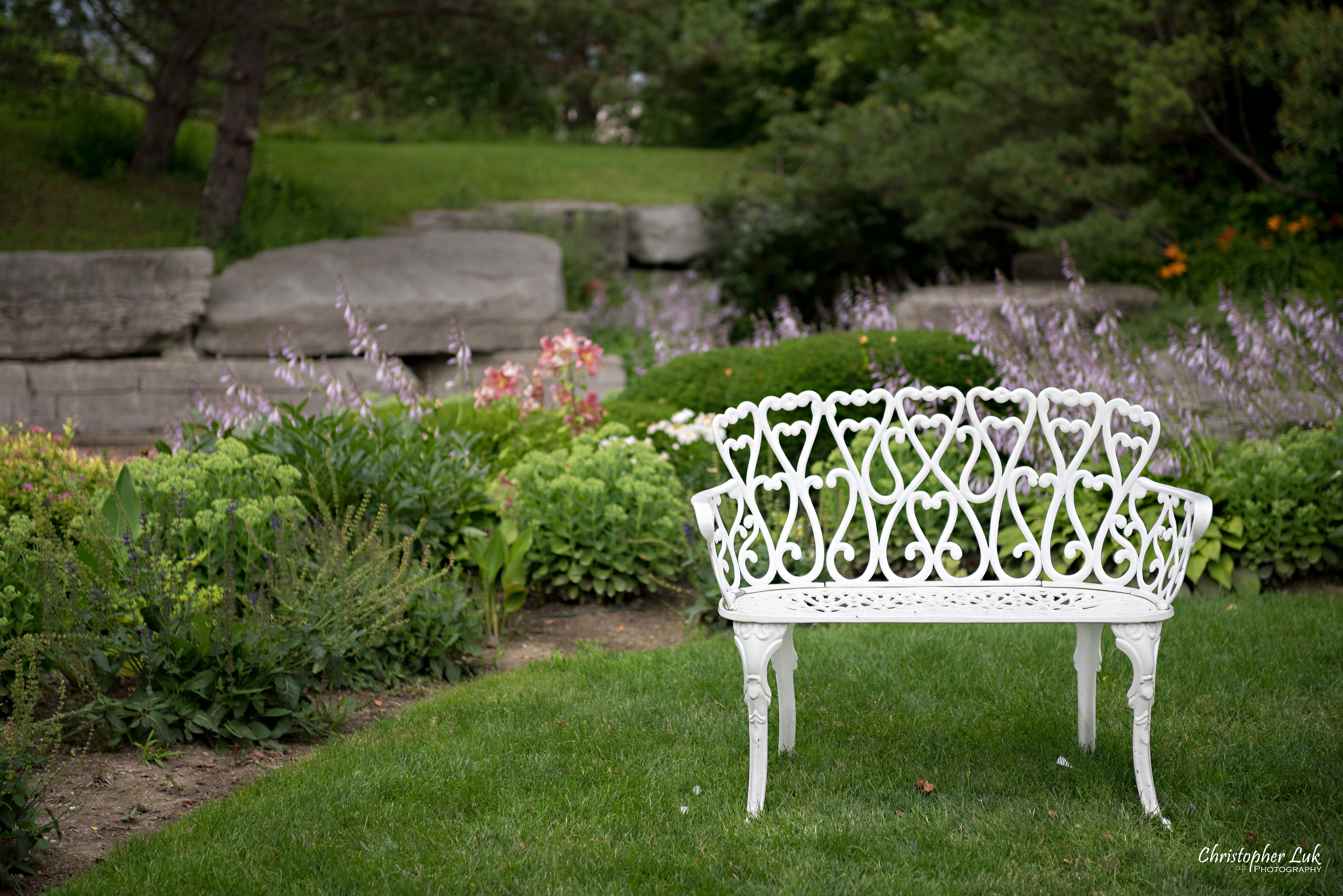 Christopher Luk - Toronto Wedding Photographer - The Manor Event Venue By Peter and Paul's - Main Grand Entrance Trees Walkway Painted White Cast Wrought Iron Bench Seat