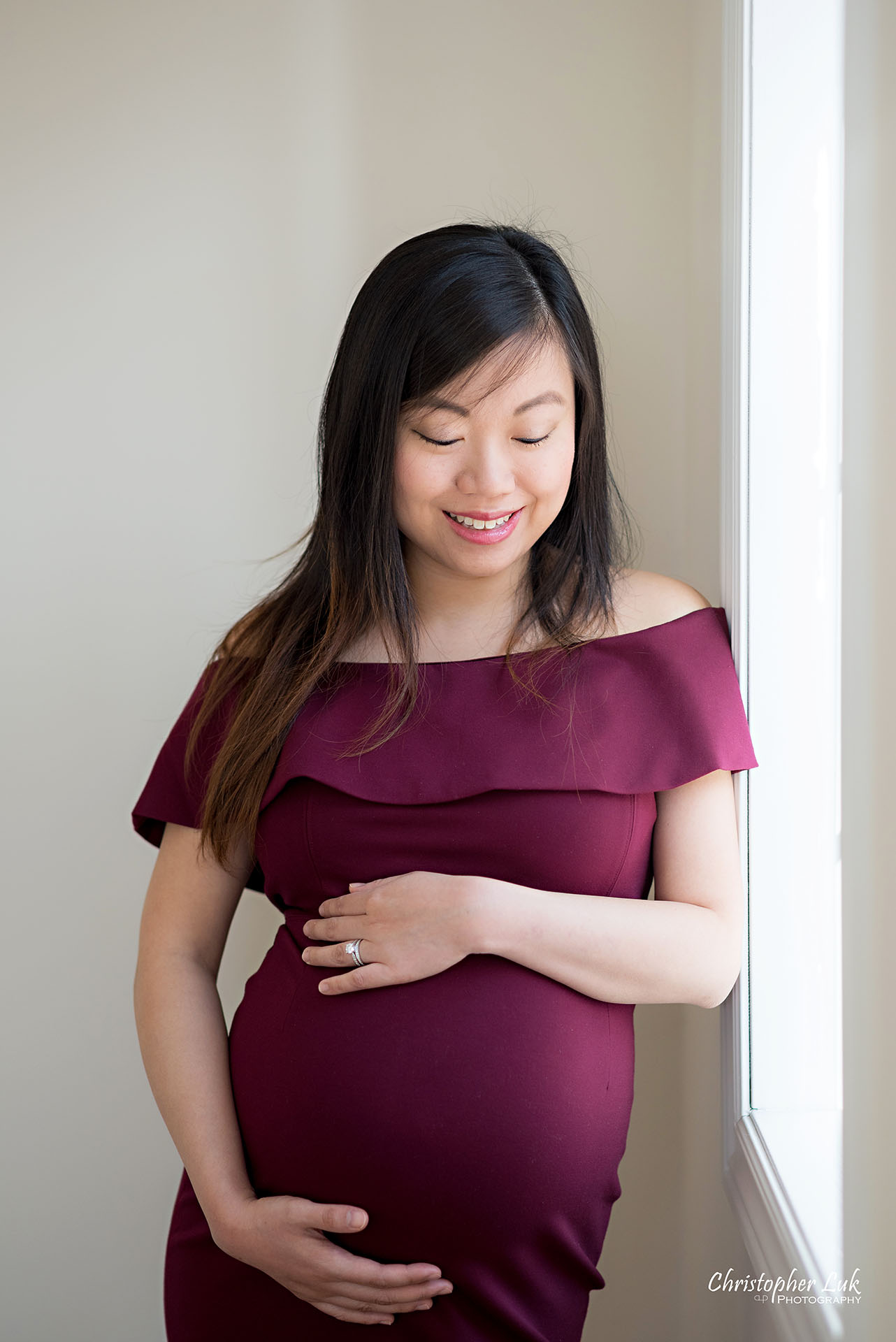 Christopher Luk Toronto Wedding Family Maternity Photographer - Markham Richmond Hill Toronto Natural Candid Photojournalistic Mom Baby Bump Baby Pregnant Pregnancy Smile Looking Down Belly Window Vertical