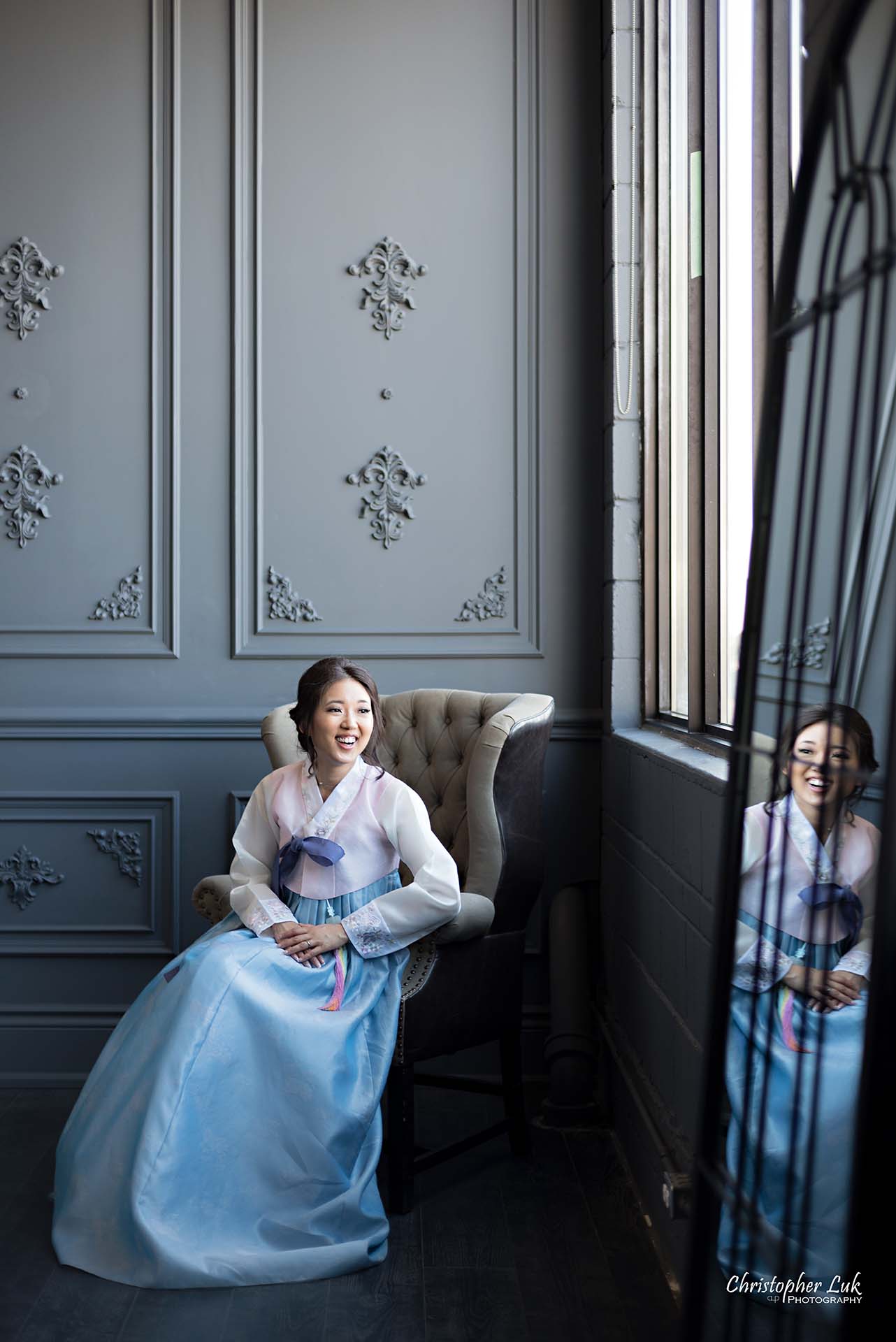 Christopher Luk Toronto Wedding Photographer - Mint Room Studios Bride Natural Candid Photojournalistic Library Studio Korean Drama Hanbok Leather Wingback Chair Mirror Vertical