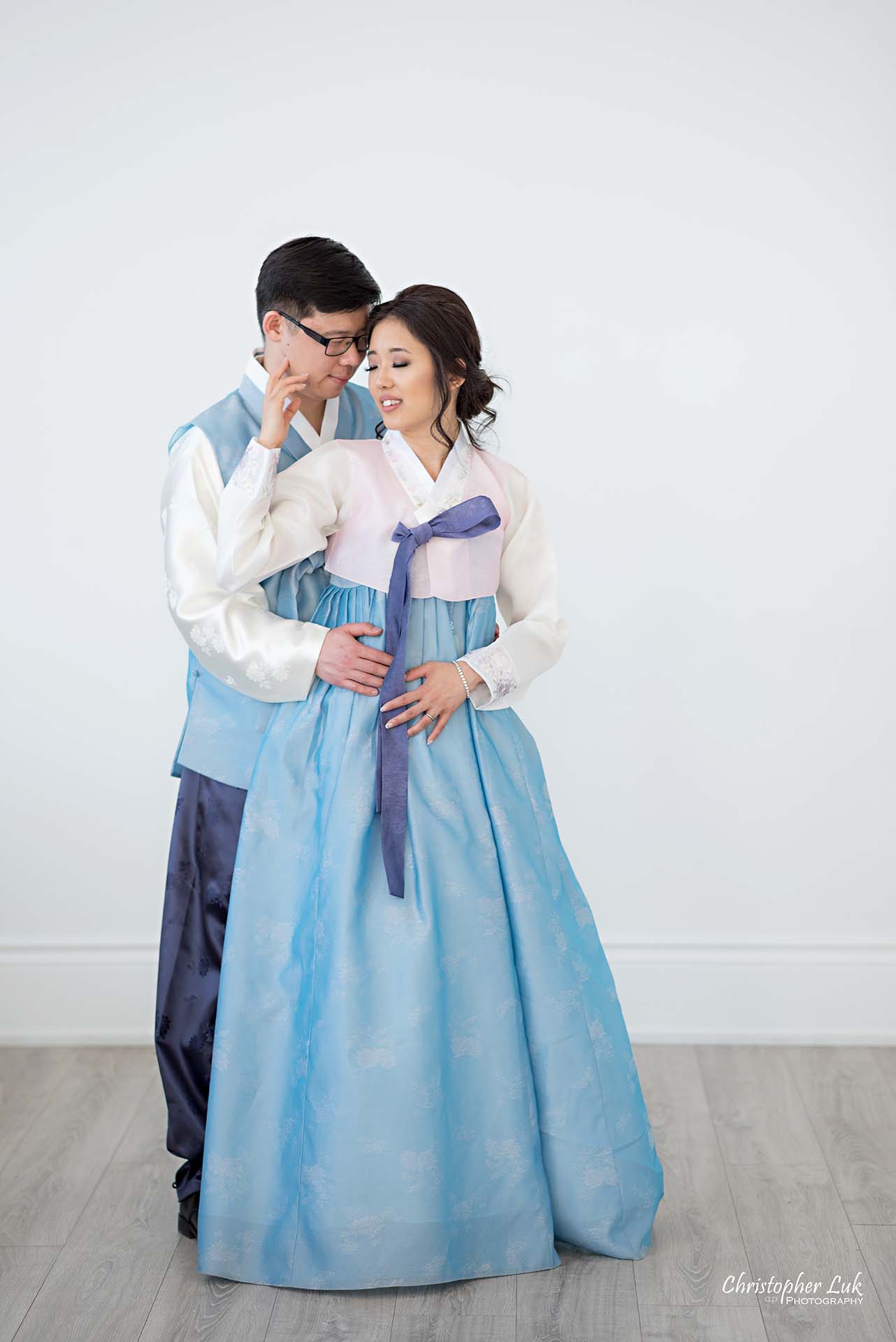 Christopher Luk Toronto Wedding Photographer - Mint Room Studios Bride Groom Natural Candid Photojournalistic Conservatory Ballroom Korean Hanbok Hold Hug Each Other Full Body