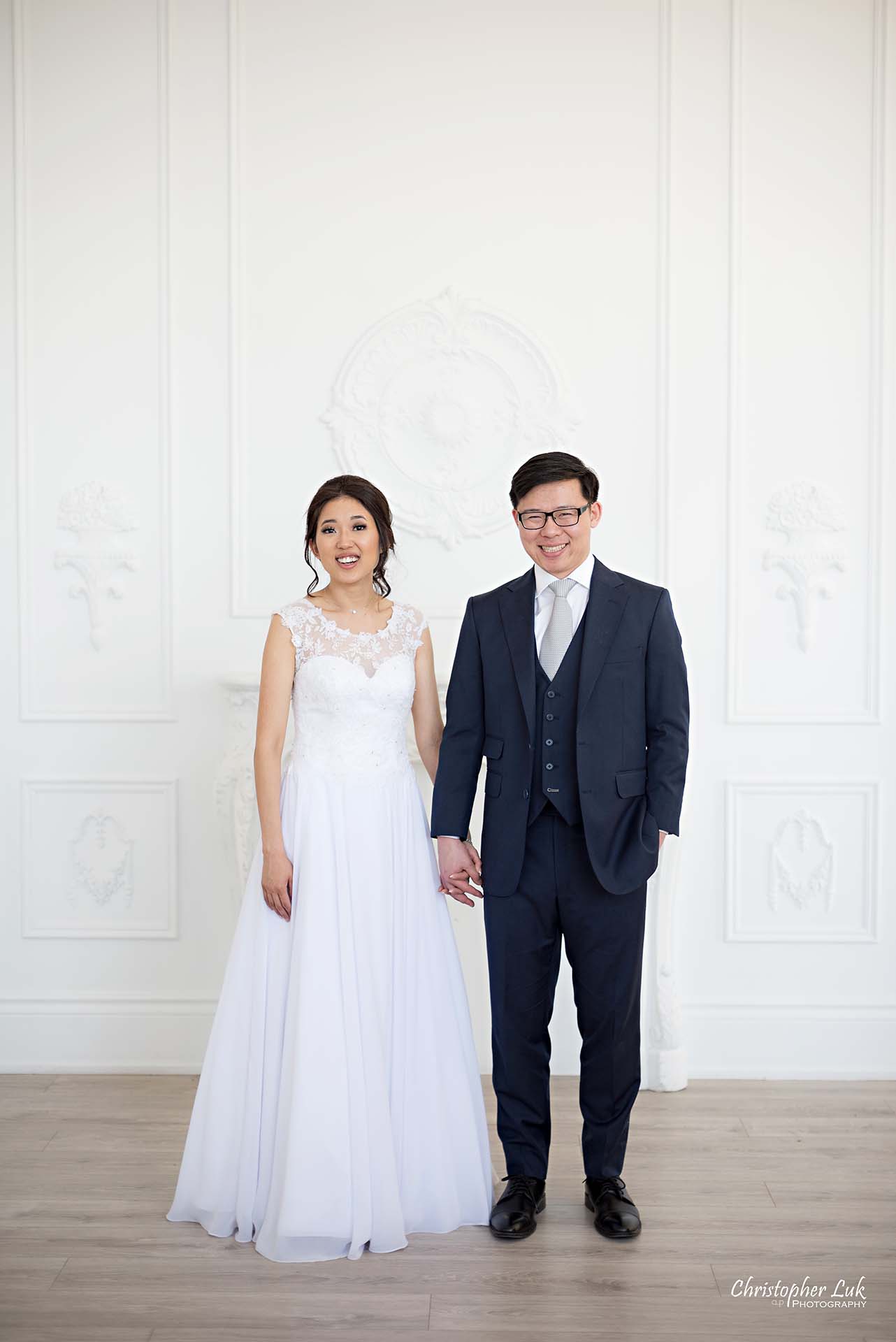 Christopher Luk Toronto Wedding Photographer - Mint Room Studios Bride Groom Natural Candid Photojournalistic Conservatory Ballroom Hug Laugh Full Body Fireplace Mantle