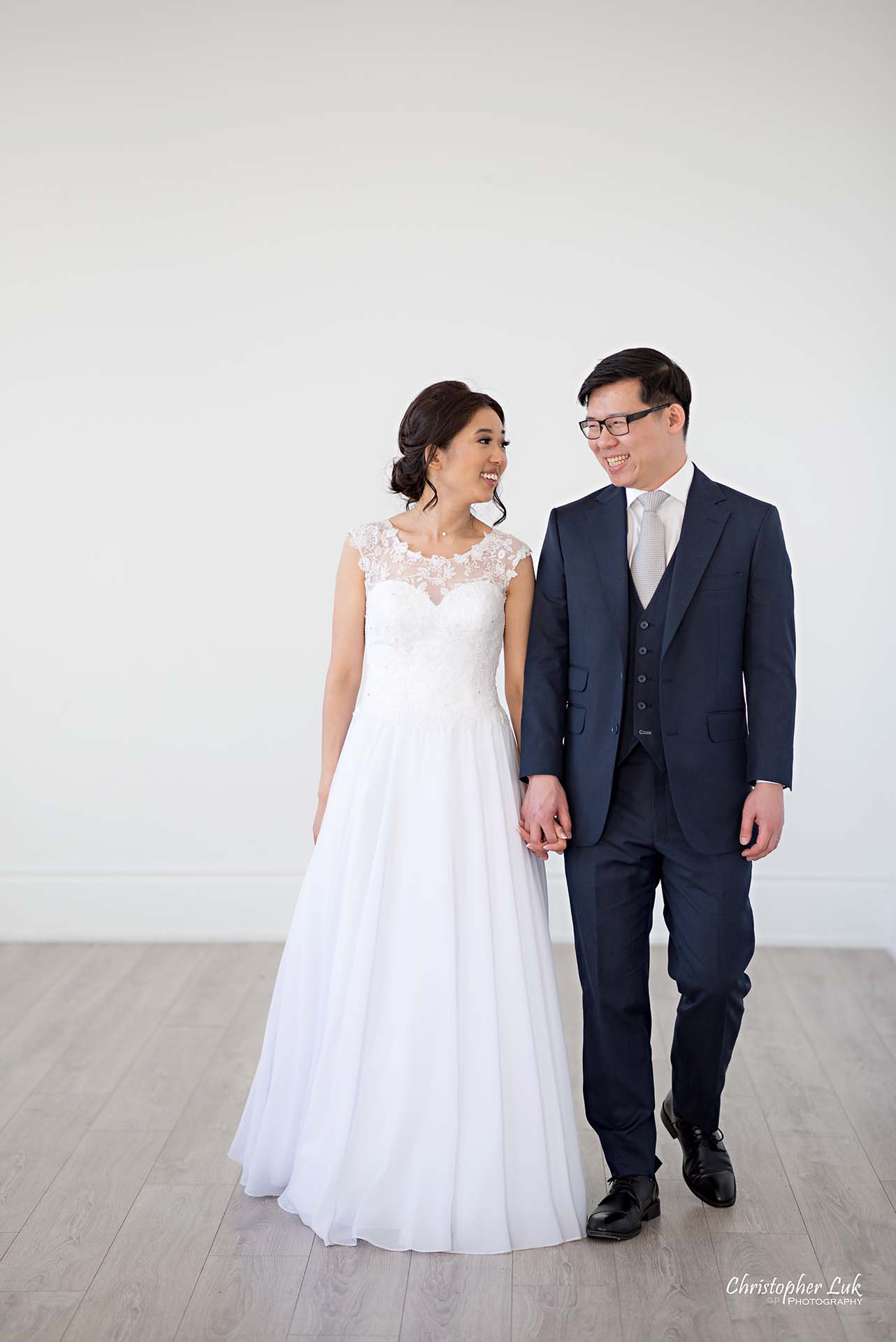 Christopher Luk Toronto Wedding Photographer - Mint Room Studios Bride Groom Natural Candid Photojournalistic Conservatory Ballroom Walking Together