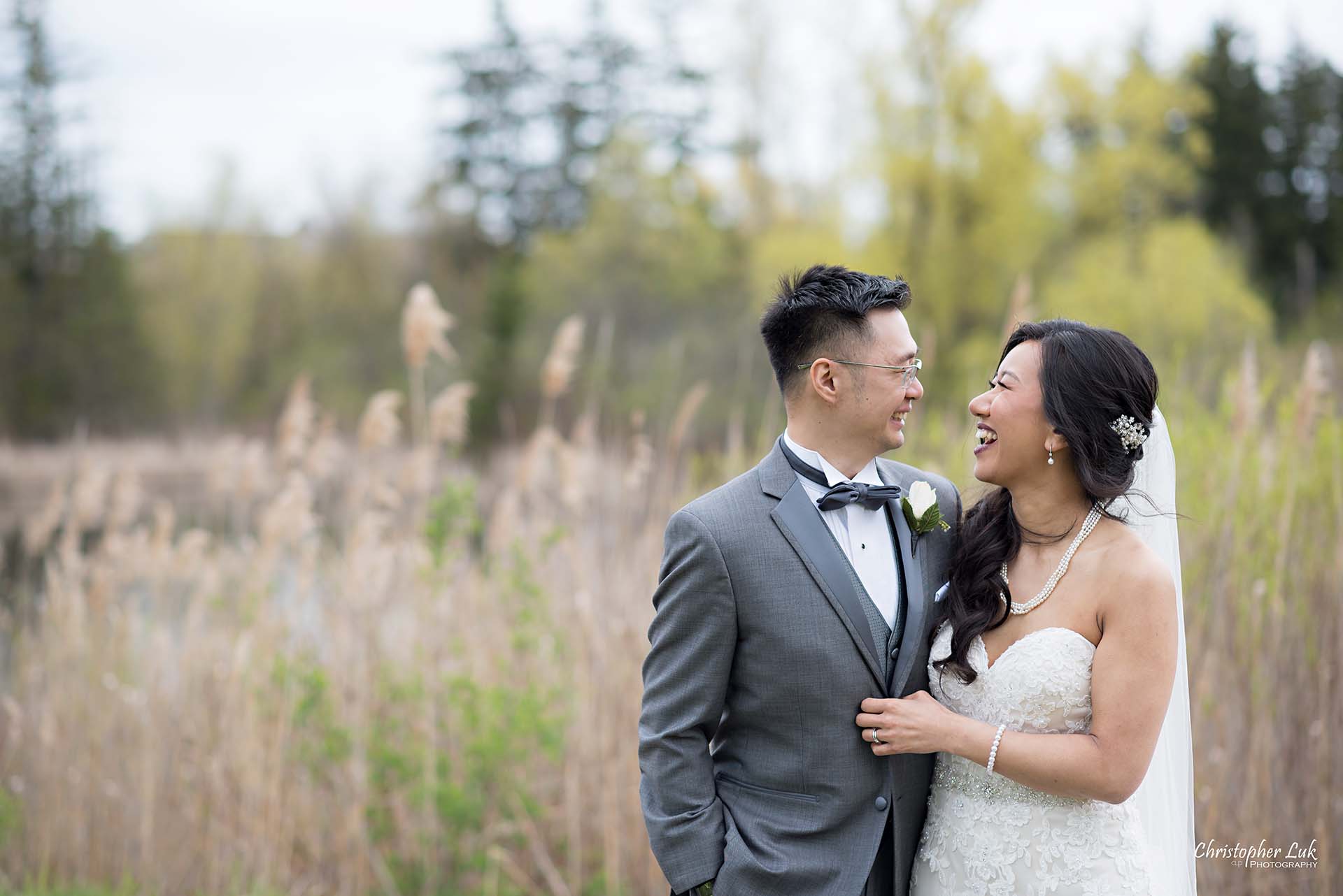 Christopher Luk Toronto Wedding Photographer Eagles Nest Golf Club Course Together Bride Groom Hold Hug Candid Natural Photojournalistic Laugh  