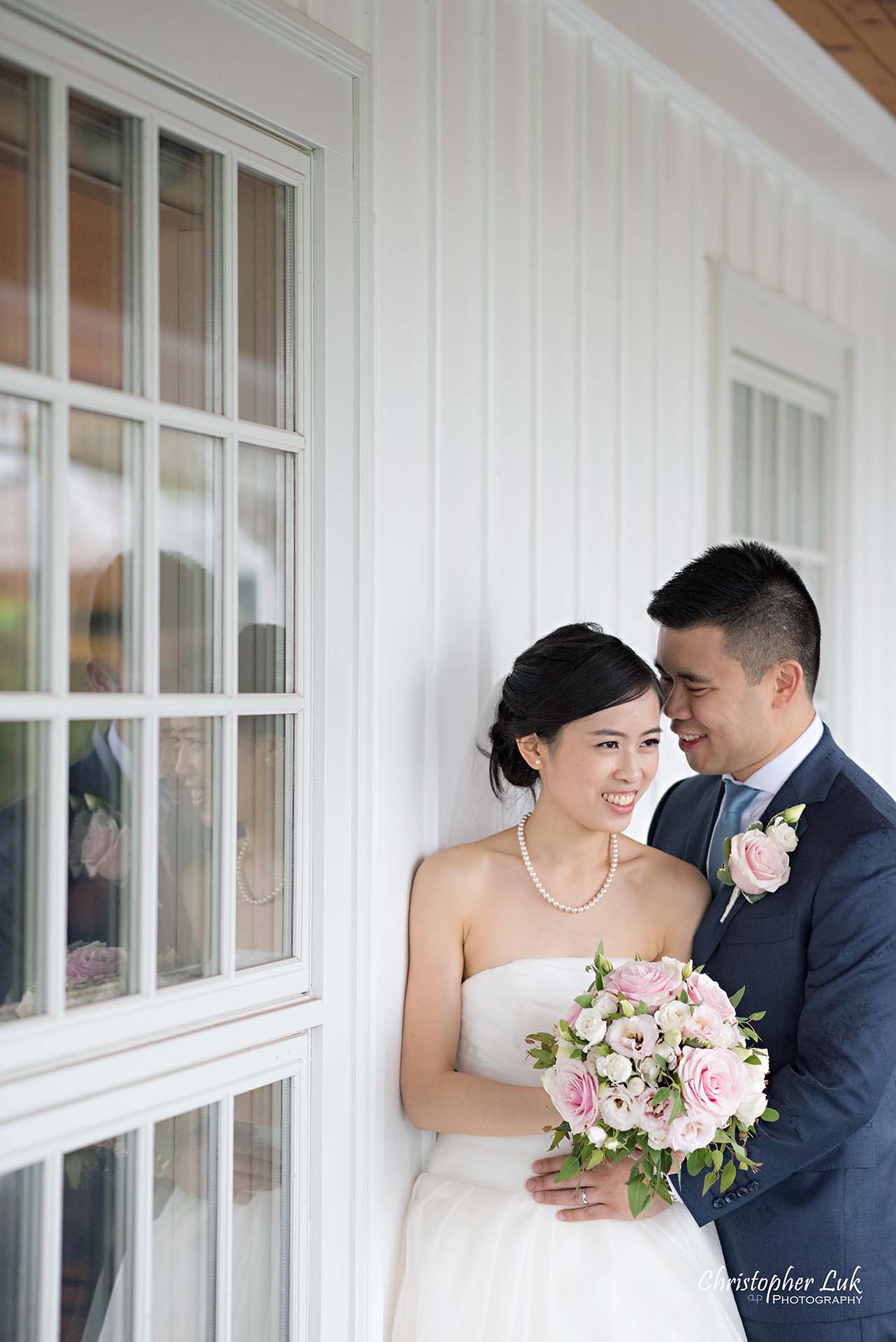 Christopher Luk Toronto Wedding Photographer Angus Glen Golf Club Markham Victoria Room Kennedy Loft Main Historic Estate Building Entrance Together Natural Candid Photojournalistic Bride Groom White Wall Window Reflection Intimate Hug