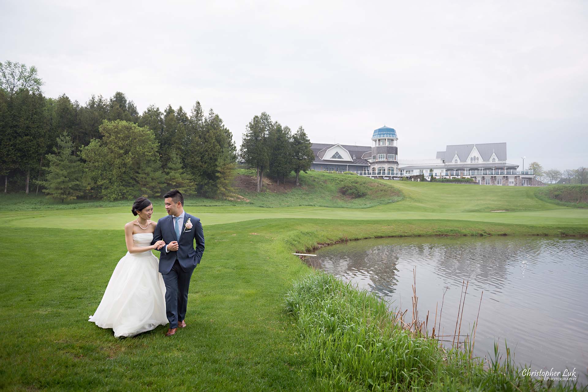 Christopher Luk Toronto Wedding Photographer Angus Glen Golf Club Markham Great Hall Dinner Reception Event Venue Green Field Sunset Bride Groom Natural Candid Photojournalistic Walking Together Green Pond Lake Clubhouse Landscape