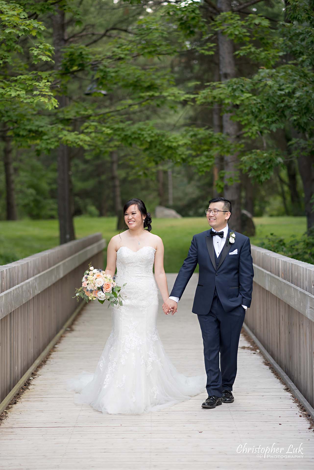 Christopher Luk Toronto Christian Community Church Kleinburg McMichael Art Gallery Vaughan Wedding Photographer Bride Groom Candid Natural Photojournalistic Wooden Bridge Boardwalk Intimate Leading Lines Looking at Each Other Walking Portrait 