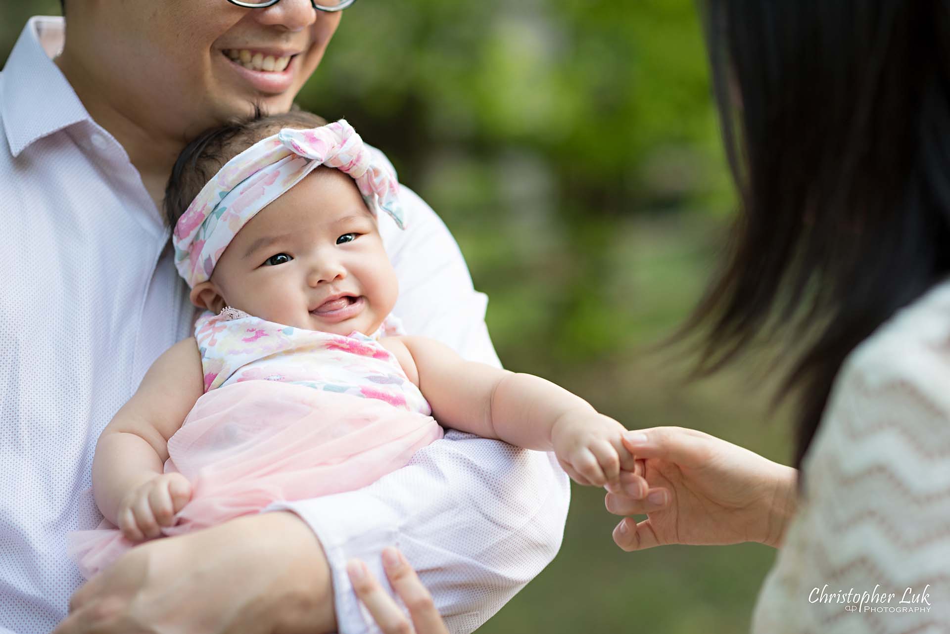 Christopher Luk Toronto Markham Family Children Photographer Candid Photojournalistic Candid Father Dad Baby Girl Daughter Hug Adorable Cute Laugh Smile Mom Mother Holding Hands