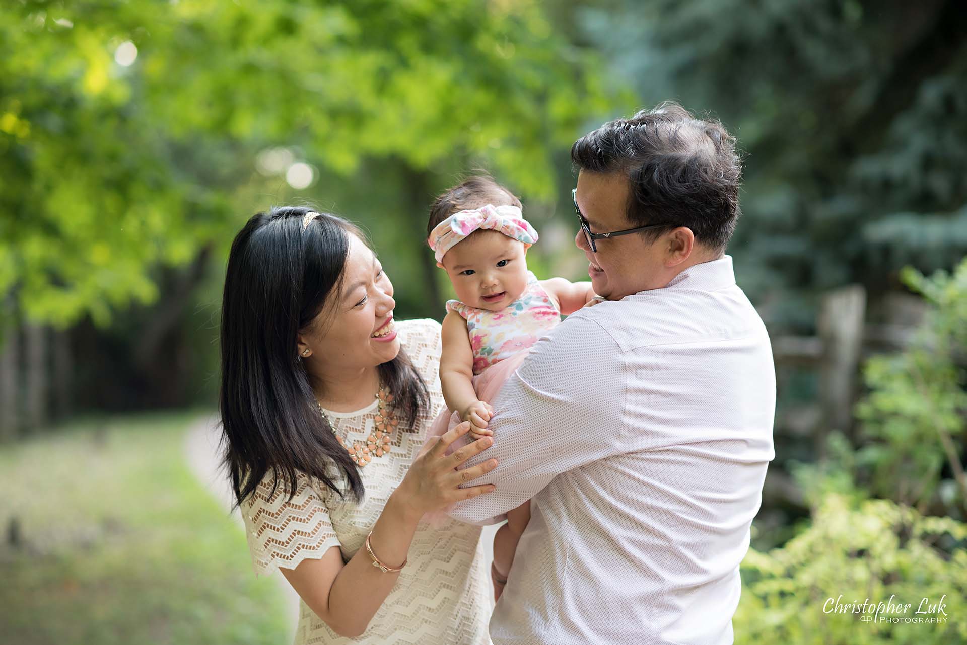 Christopher Luk Toronto Markham Family Children Photographer Candid Photojournalistic Candid Father Dad Baby Girl Daughter Adorable Cute Laugh Mom Mother Hug Smile small