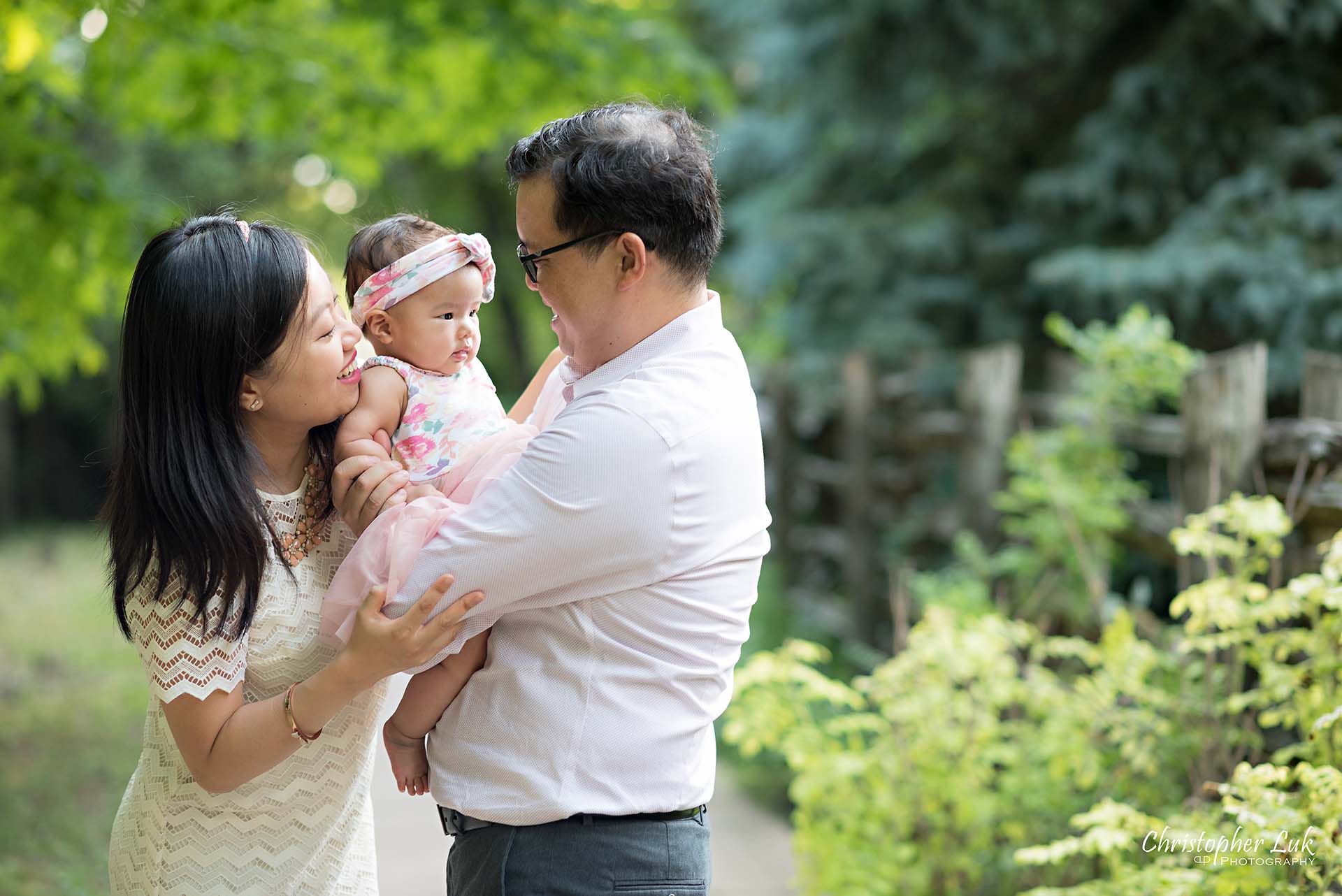 Christopher Luk Toronto Markham Family Children Photographer Candid Photojournalistic Candid Father Dad Baby Girl Daughter Adorable Cute Laugh Smile Mom Mother Hug