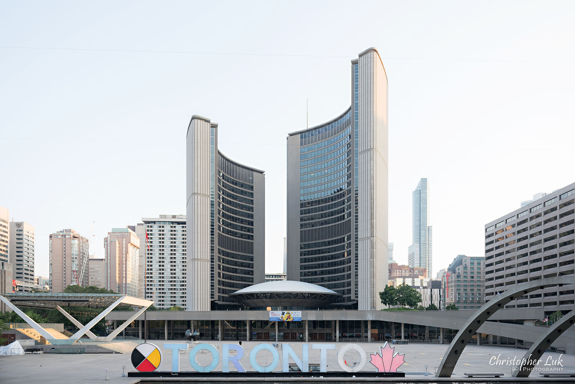 Christopher Luk Wedding Photographer Toronto City Hall Nathan Philips Square Elevated Bridge Arches Archway Wide Landscape Toronto 3D Sign Water Pool Fountain Feature Wide Landscape