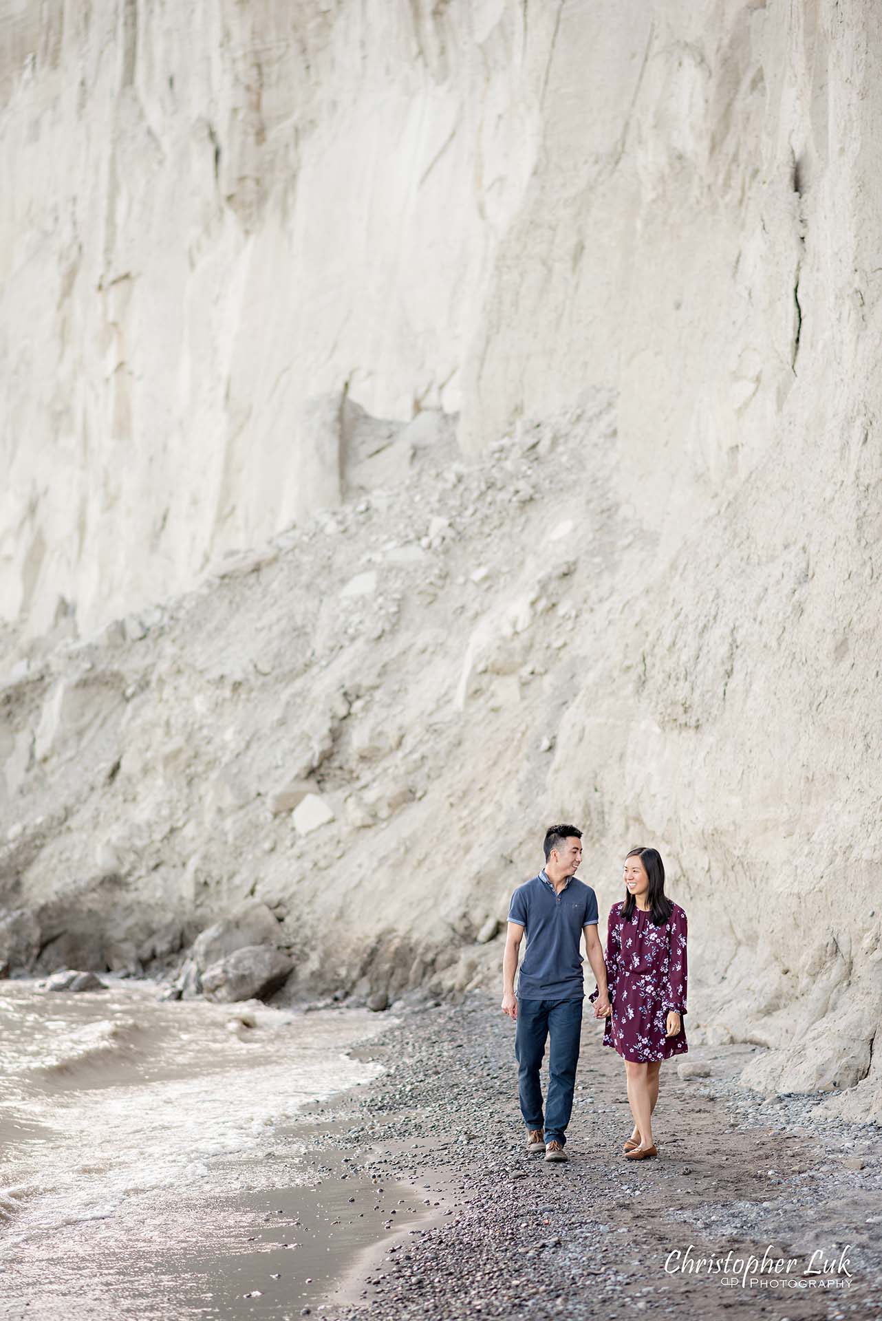 Christopher Luk Toronto Photographer Scarborough Bluffs Beach Park Sunset Surprise Wedding Marriage Engagement Proposal Candid Natural Photojournalistic Bride Groom Waterfront Water Lake Ontario Background Beachfront Sand Walking Together Holding Hands Edge of Water Smile Stone Portrait