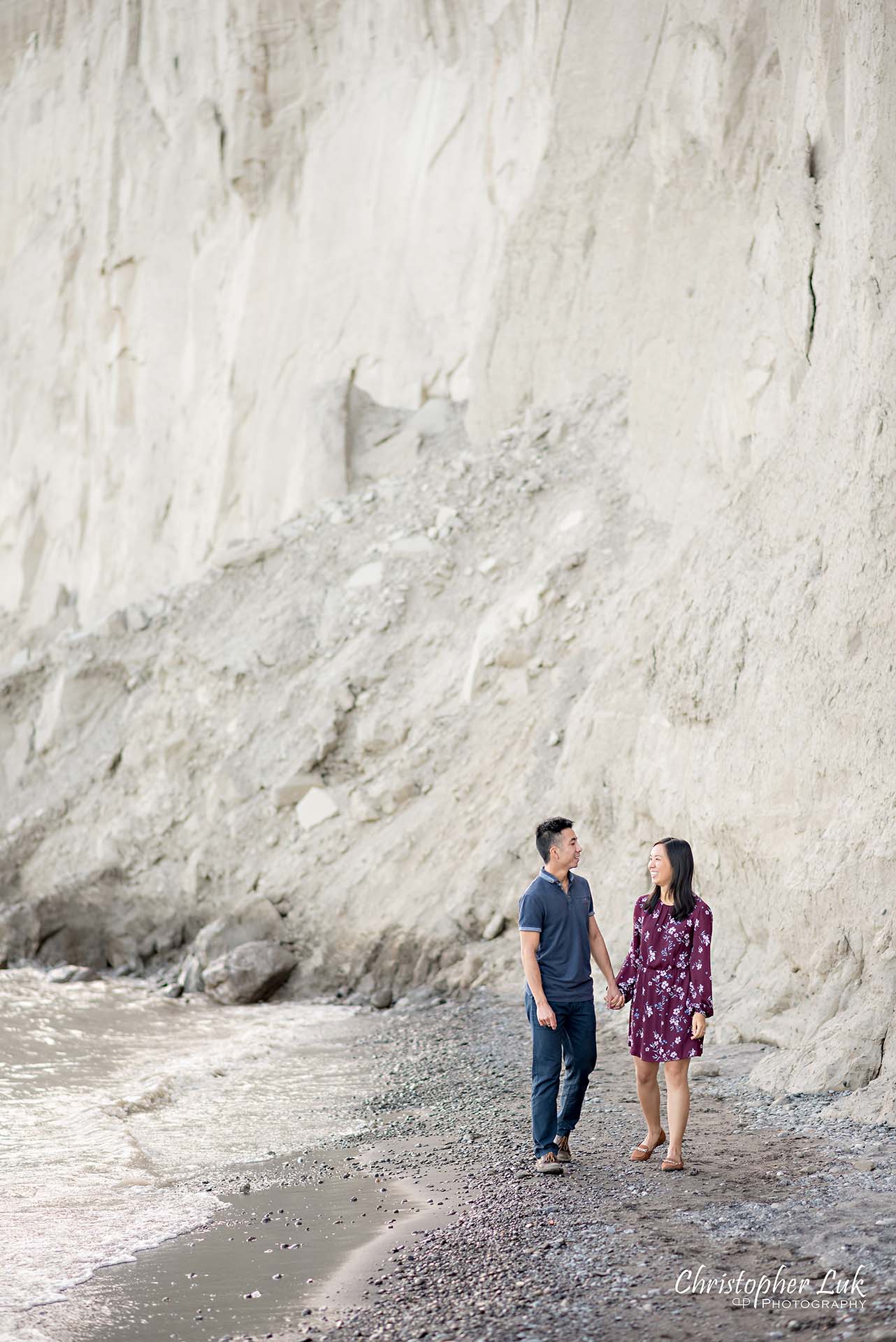 Christopher Luk Toronto Photographer Scarborough Bluffs Beach Park Sunset Surprise Wedding Marriage Engagement Proposal Candid Natural Photojournalistic Bride Groom Waterfront Water Lake Ontario Background Beachfront Sand Walking Together Holding Hands Edge of Water Smile Stone Portrait