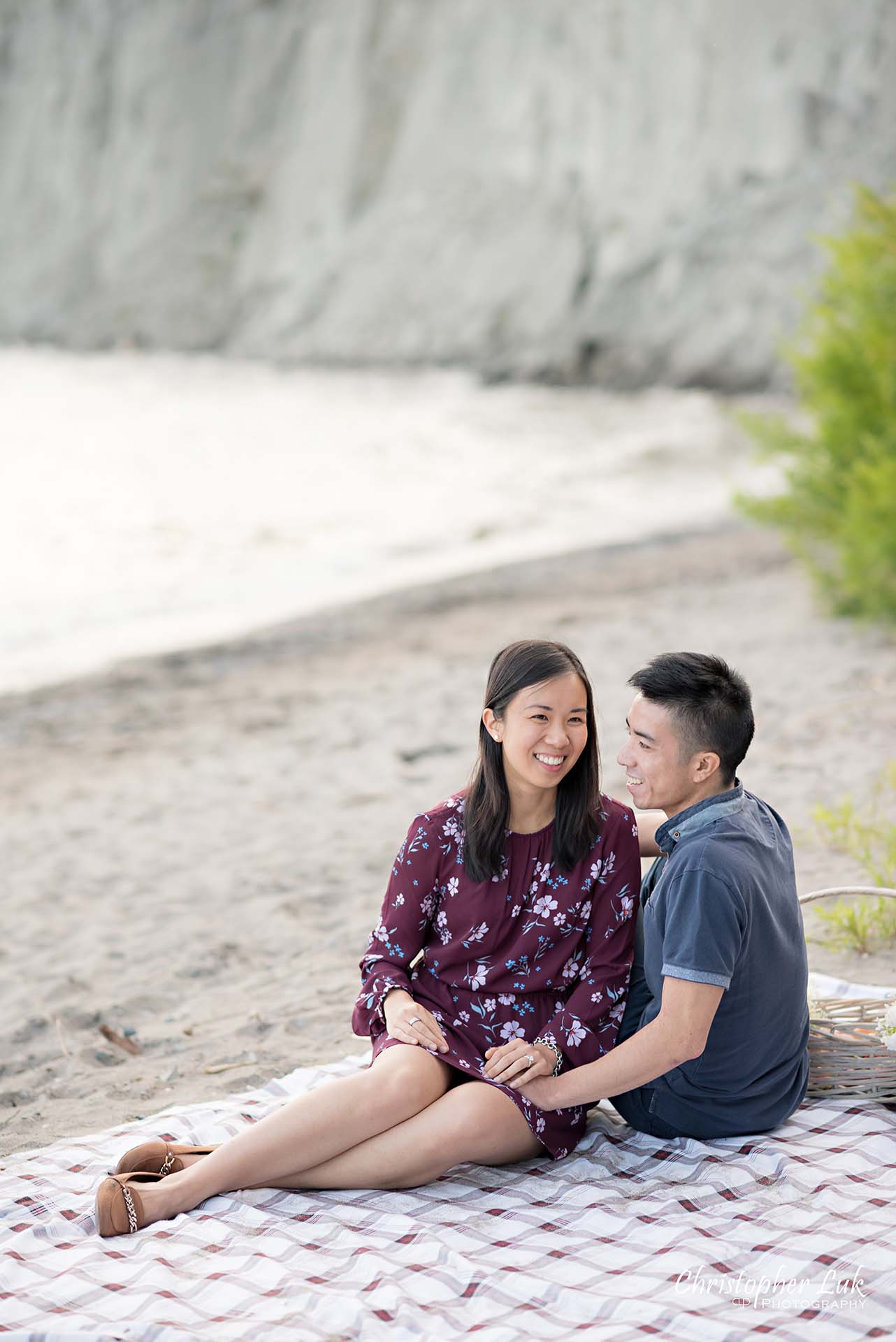 Christopher Luk Toronto Photographer Scarborough Bluffs Beach Park Sunset Surprise Wedding Marriage Engagement Proposal Candid Natural Photojournalistic Bride Groom Picnic Blanket Sitting Together Laughing Smiling Portrait