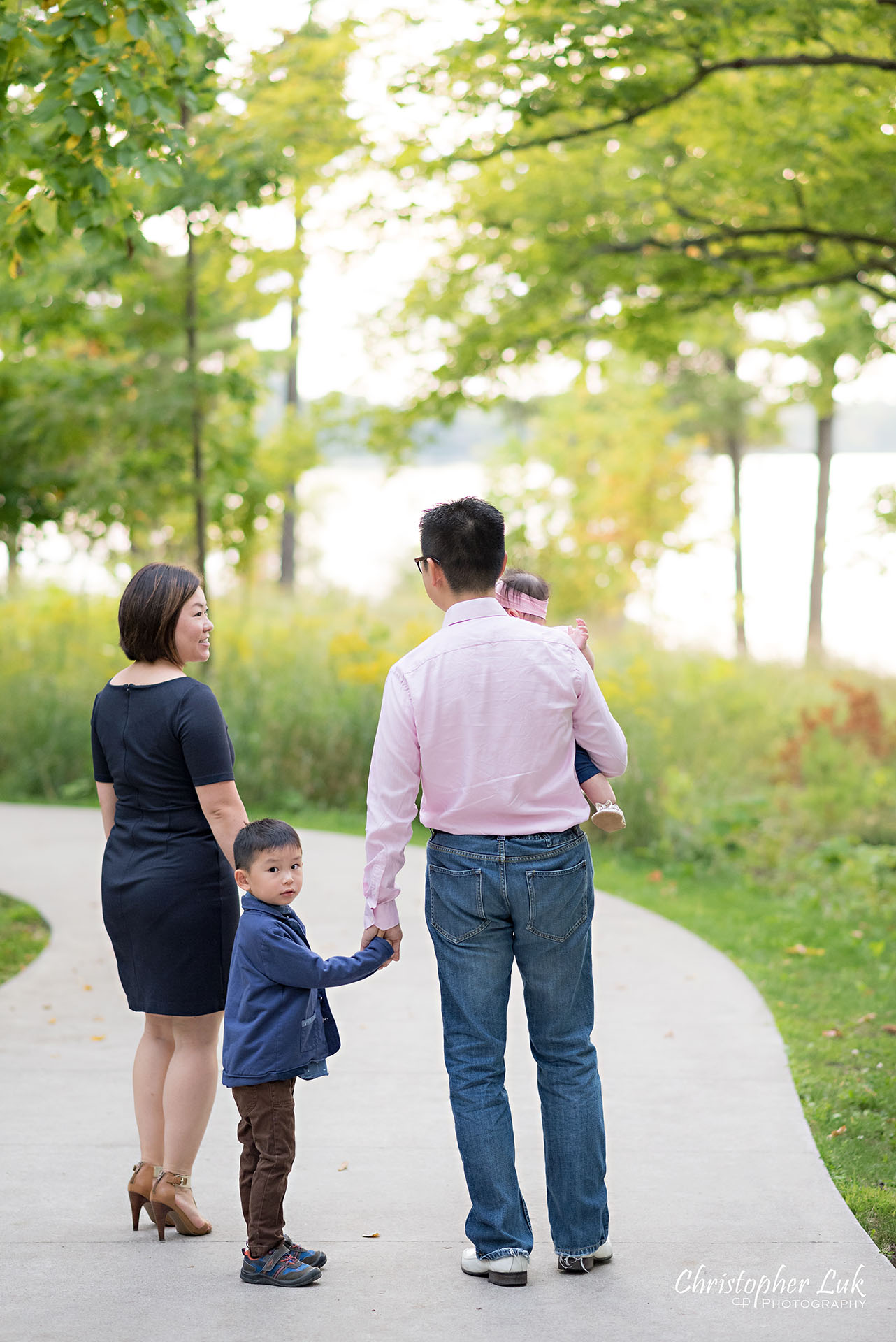 Christopher Luk Toronto Photographer Lake Wilcox Park Family Baby Newborn Richmond Hill Session Mother Father Mom Dad Son Brother Daughter Sister Candid Natural Photojournalistic Looking Back Walking