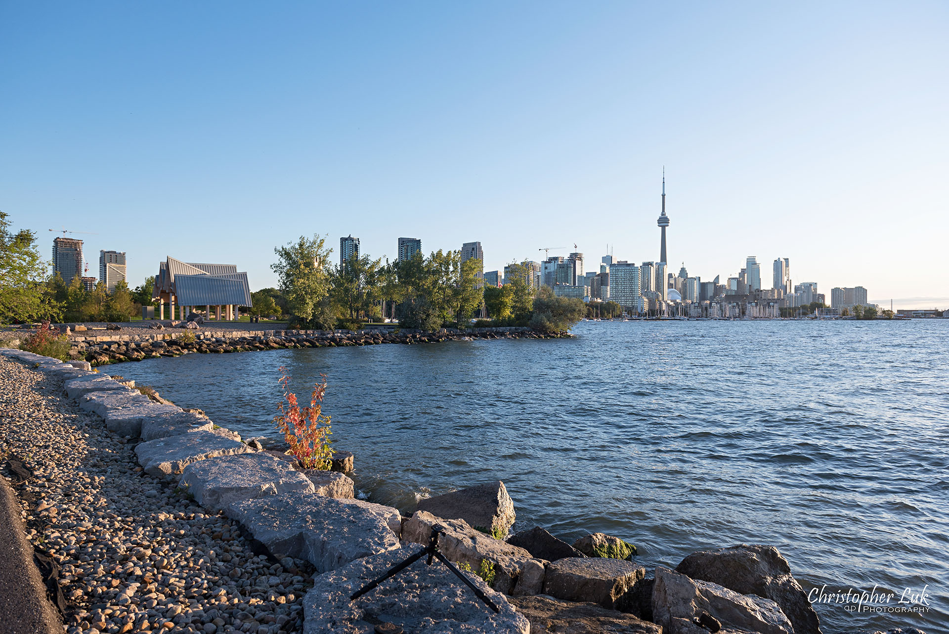 Christopher Luk Trillium Park Ontario Place Waterfront Engagement Session Toronto Wedding Photographer CN Tower Skyline Background Sunrise Wide Landscape Hotel X