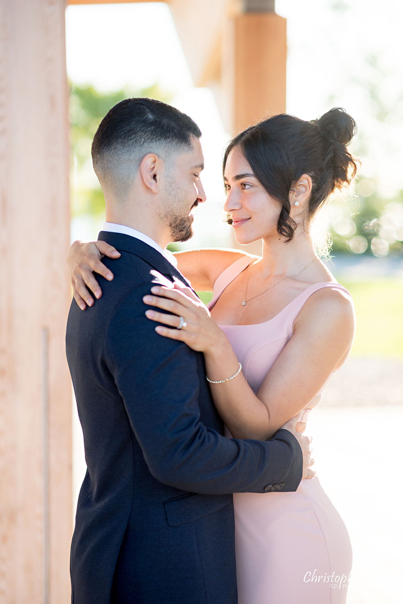 Christopher Luk Trillium Park Ontario Place Waterfront Engagement Session Toronto Wedding Photographer Bride Groom Natural Candid Photojournalistic Wood Evergreen Pavilion Hug Hold Look Each Other