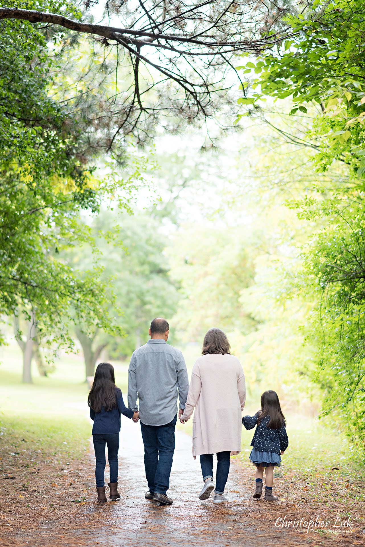 Christopher Luk Family Photographer Toronto Markham Candid Natural Photojournalistic Father Dad Mom Mother Motherhood Fatherhood Daughters Sisters Holding Hands Walking Together