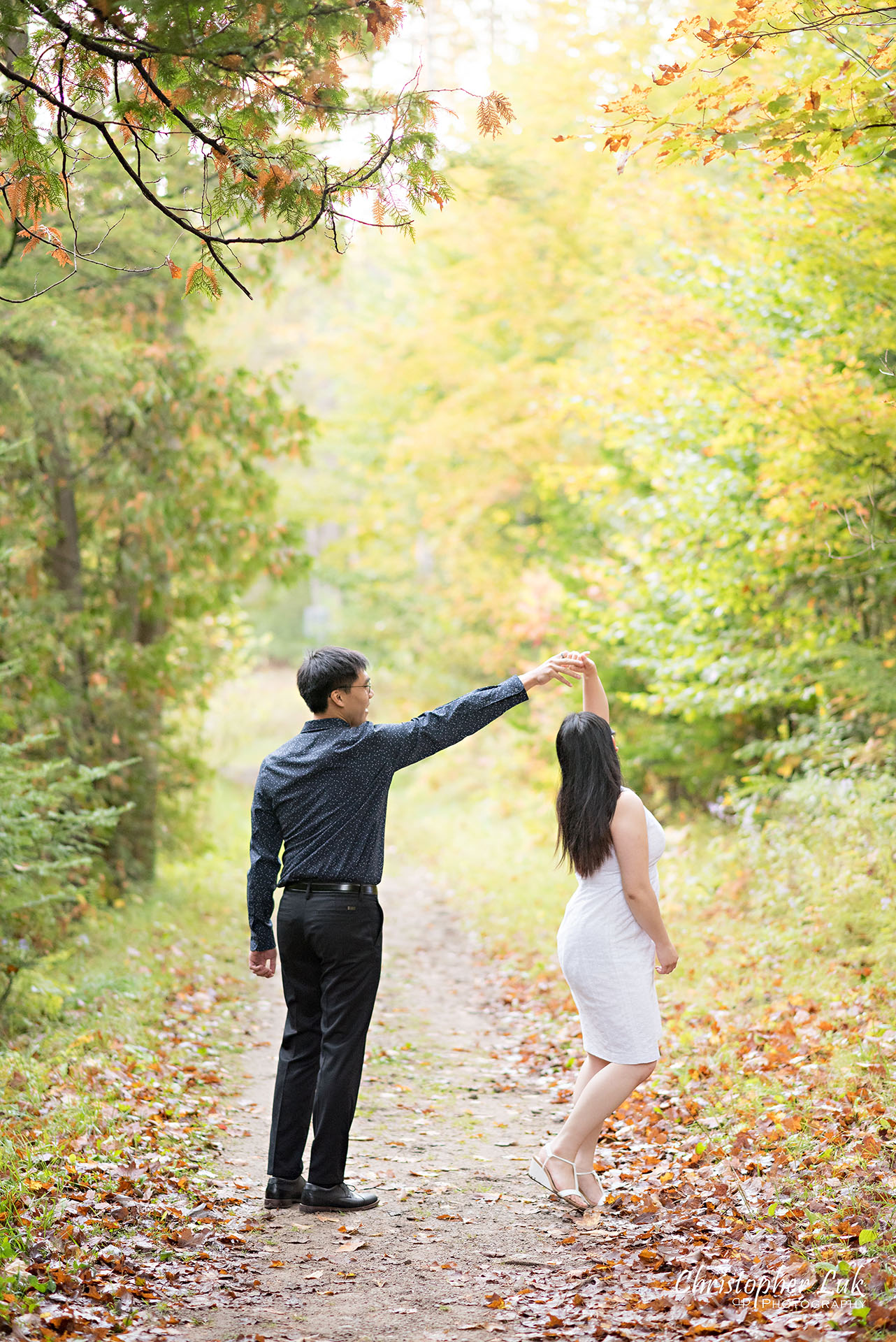 Christopher Luk Toronto Wedding Photographer Stouffville Forest Conservation Park Engagement Session Candid Natural Photojournalistic Bride Groom Dancing Twirling Spinning