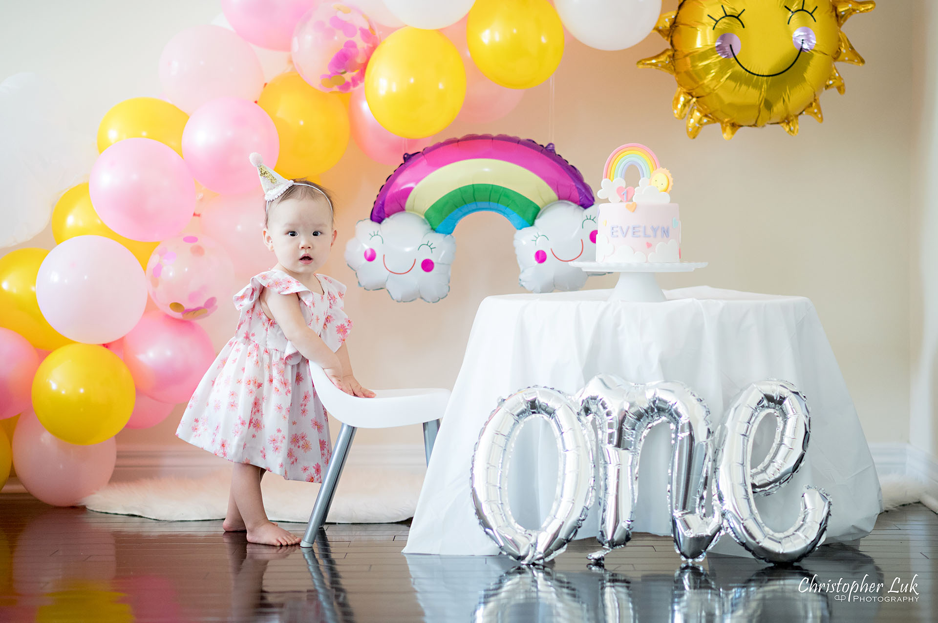 Christopher Luk Toronto Markham Family Photographer Baby Girl First Birthday Balloon Arch Rainbow Pink Hat Rainbow Sun Cake