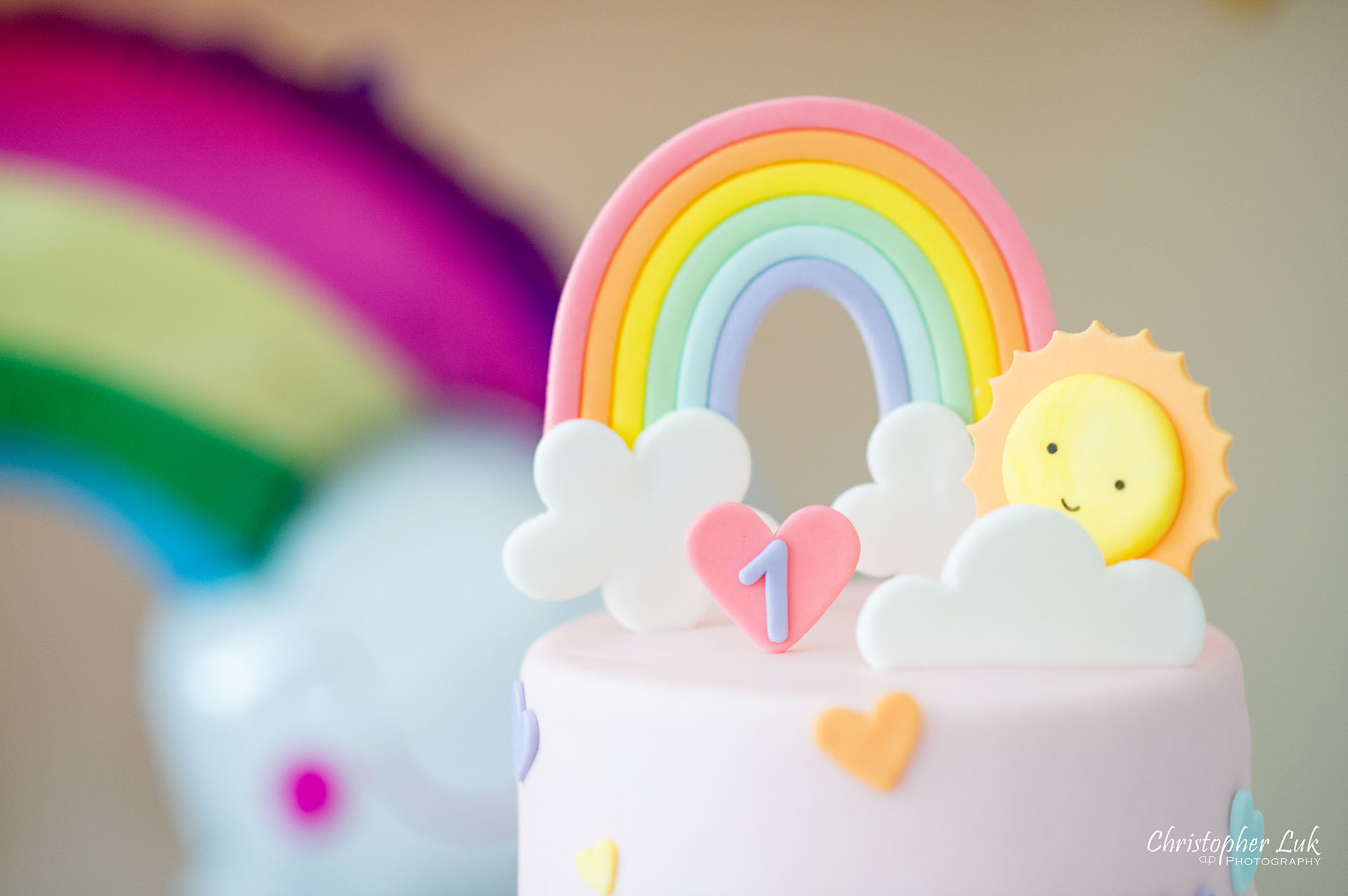 Christopher Luk Toronto Markham Family Photographer Baby Girl First Birthday Balloon Arch Rainbow Pink Sun Clouds Decor Details