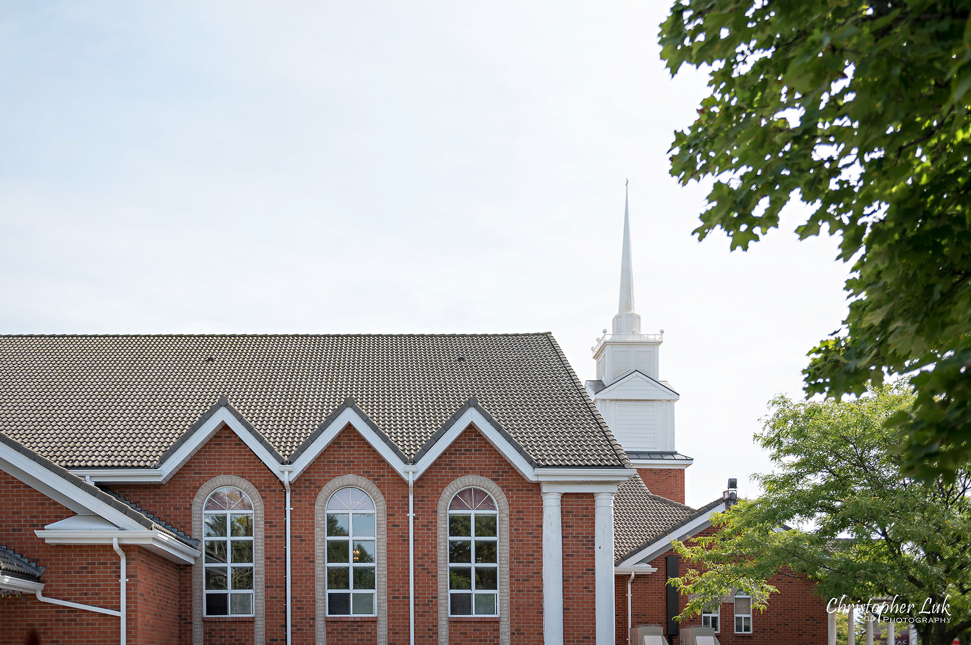 Christopher Luk Toronto Wedding Photographer Bridle Trail Baptist Church Unionville Main Street Crystal Fountain Event Venue Ceremony Location Exterior Trees