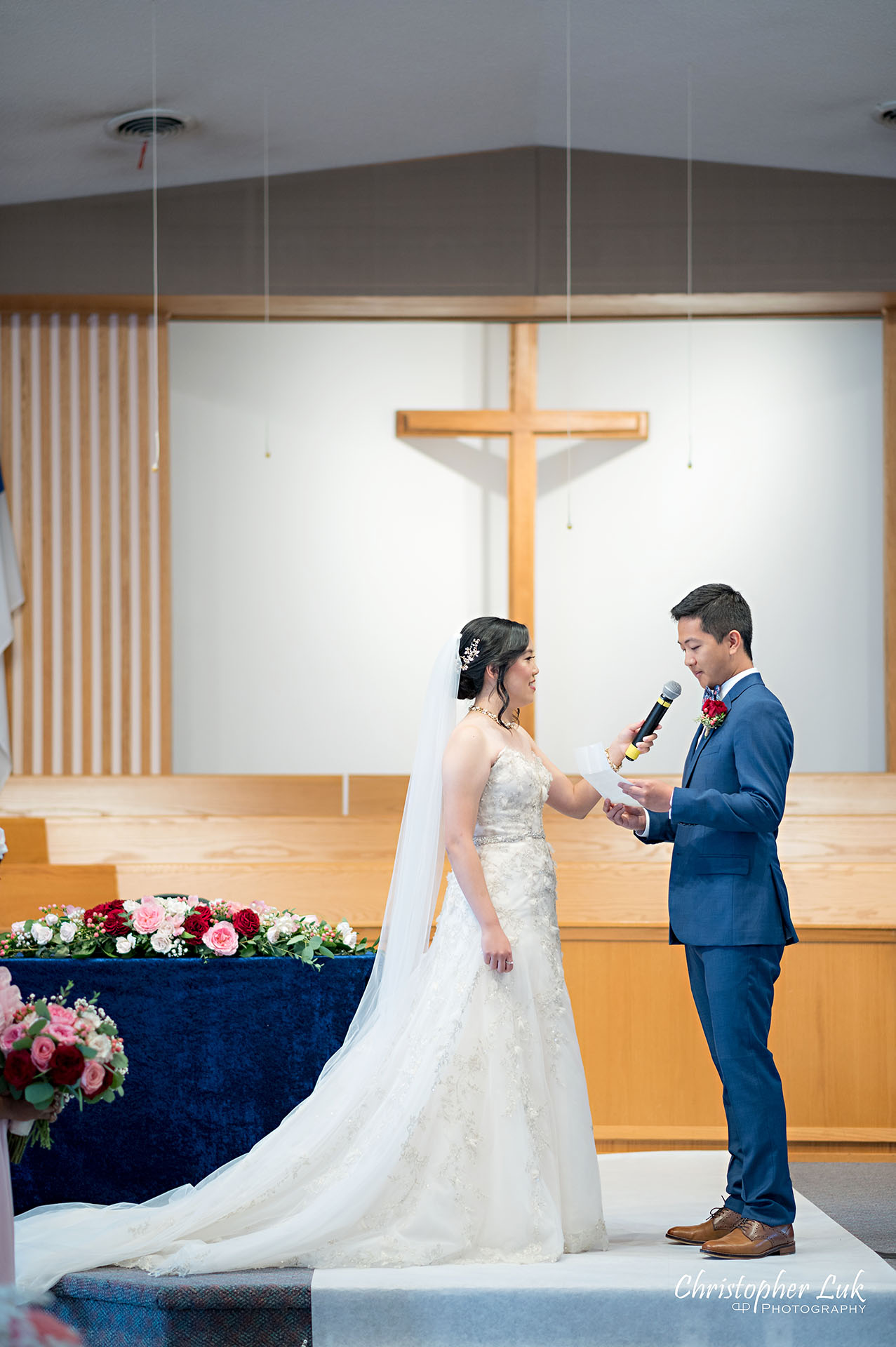 Christopher Luk Toronto Wedding Photographer Bridle Trail Baptist Church Unionville Main Street Crystal Fountain Event Venue Ceremony Location Interior Bride Groom Sanctuary Natural Photojournalistic Candid Vows Vertical Portrait Cross Altar Stage