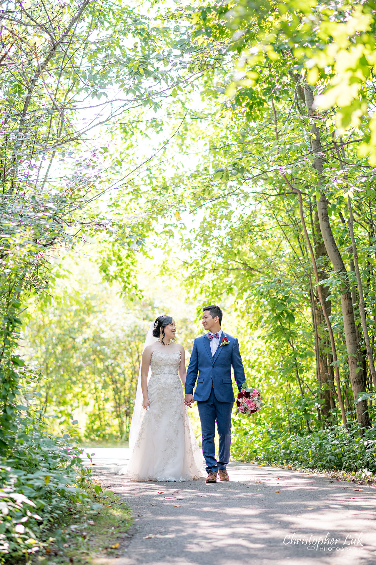 Christopher Luk Toronto Wedding Photographer Bridle Trail Baptist Church Unionville Main Street Crystal Fountain Event Venue Bride Groom Natural Photojournalistic Candid Creative Portrait Session Pictures Holding Hands Walking Together Path Trail Walkway Park Forest