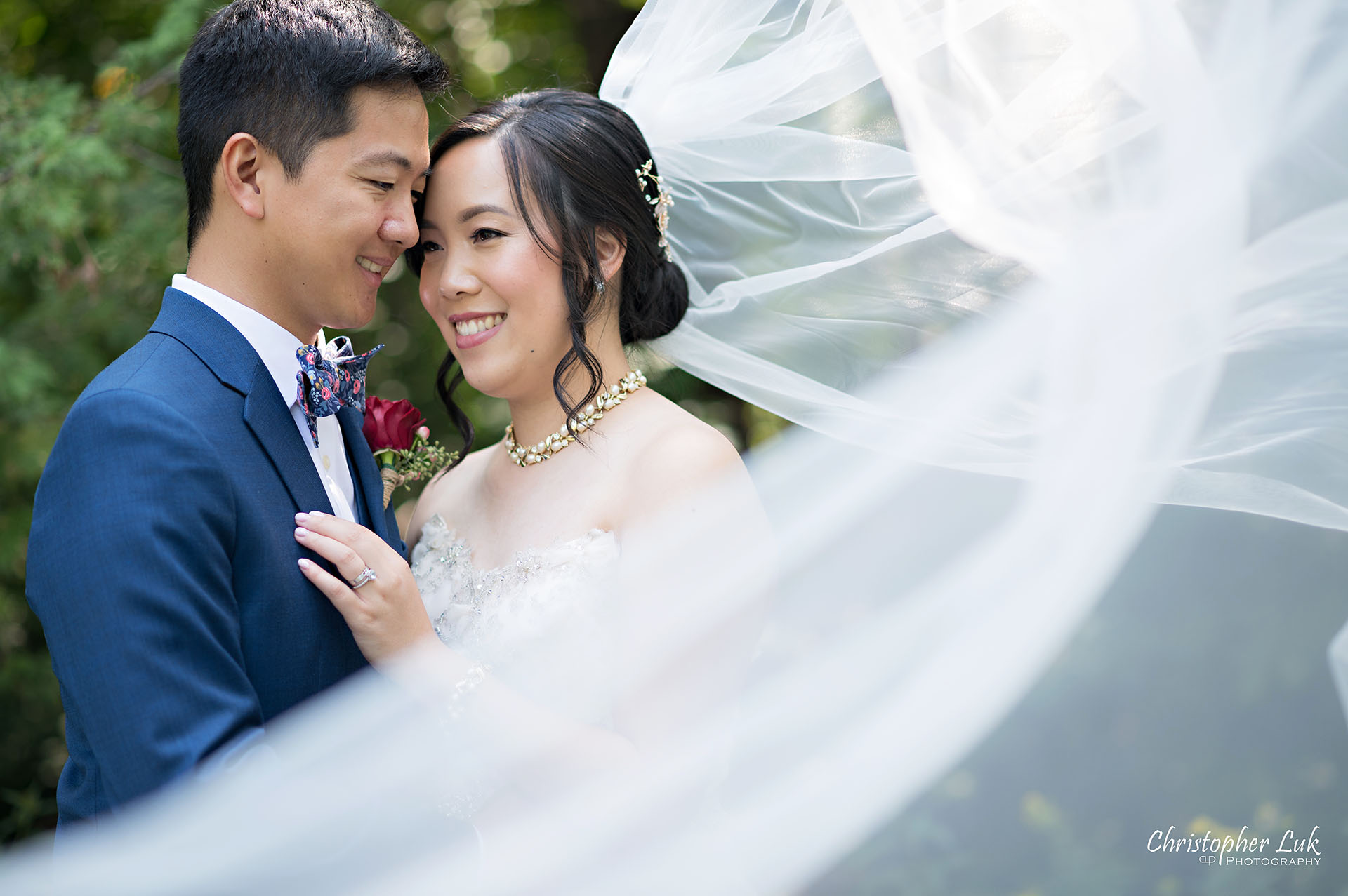 Christopher Luk Toronto Wedding Photographer Bridle Trail Baptist Church Unionville Main Street Crystal Fountain Event Venue Bride Groom Natural Photojournalistic Candid Creative Portrait Session Pictures Forest Park Hug Intimate Flowing Flying Veil 