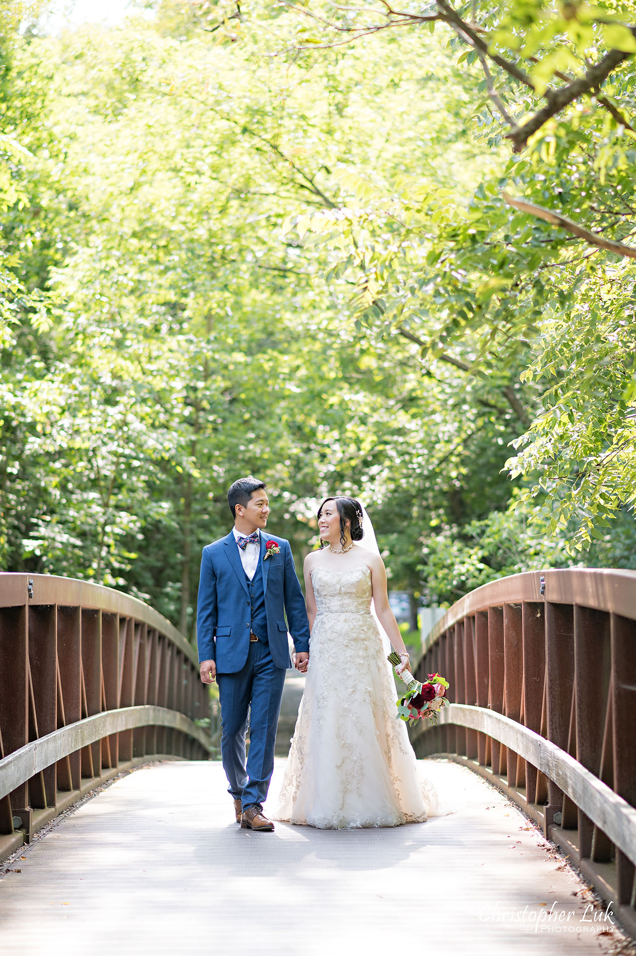 Christopher Luk Toronto Wedding Photographer Bridle Trail Baptist Church Unionville Main Street Crystal Fountain Event Venue Bride Groom Natural Photojournalistic Candid Creative Portrait Session Pictures Forest Trail Walkway Bridge Park Holding Hands Walking Together
