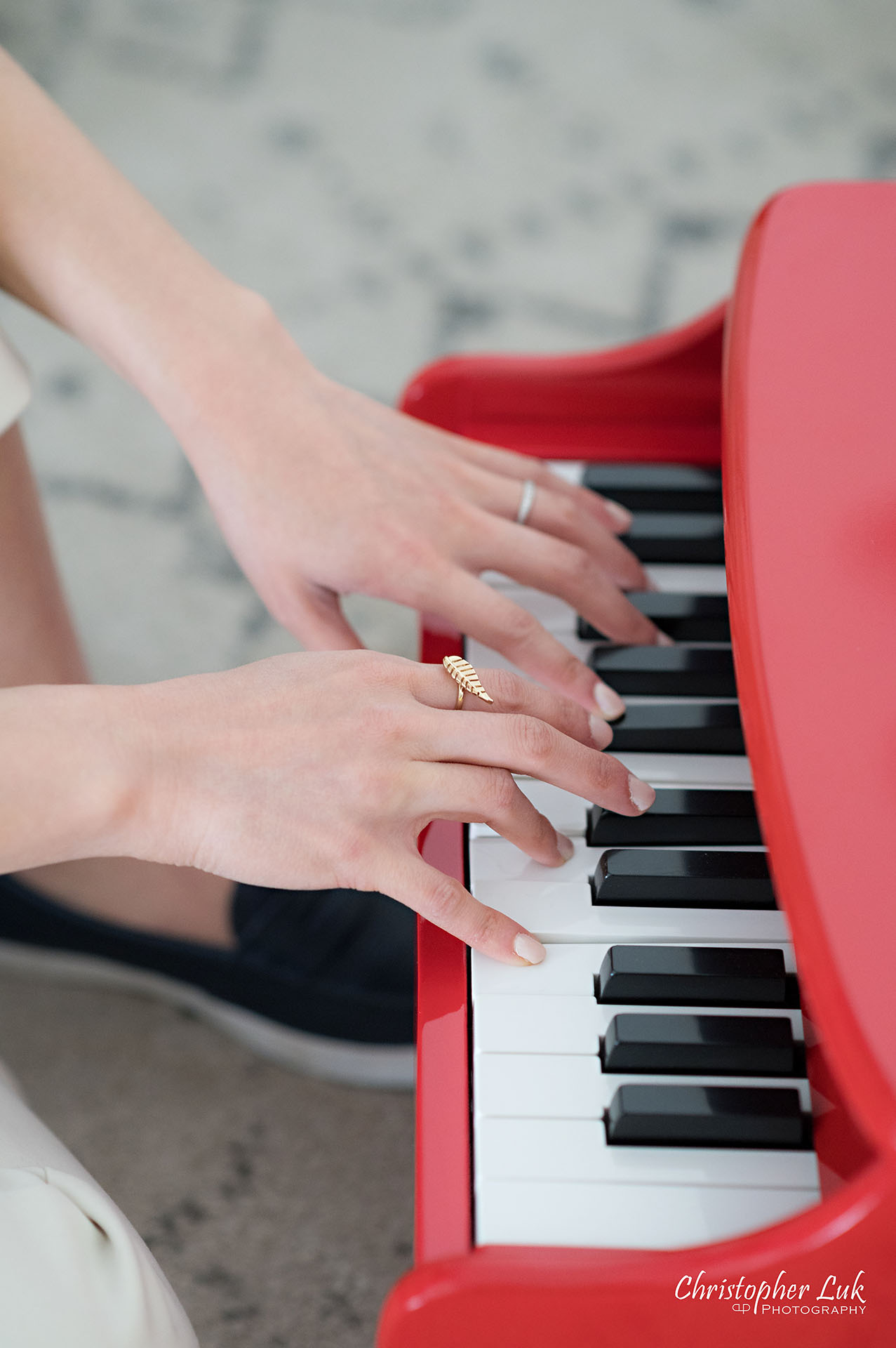 Christopher Luk Toronto Personal Branding Photographer Singer Songwriter Musician Music Natural Candid Photojournalistic Schoenhut Red Little Mini Piano Keys Pianist Fingers Detail Portrait