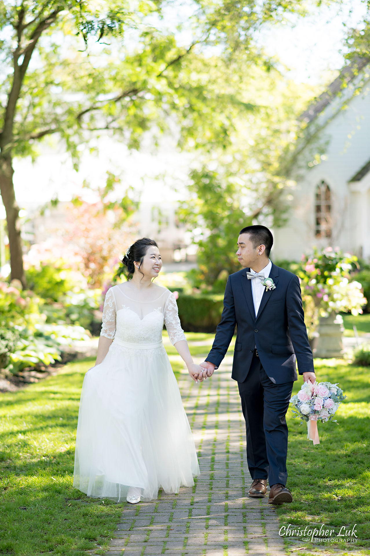 Christopher Luk Toronto Wedding Photographer The Doctor's House Chapel Kleinburg Natural Candid Photojournalistic Posed Bride Groom Holding Hands Together Walking Garden Micro Microwedding 