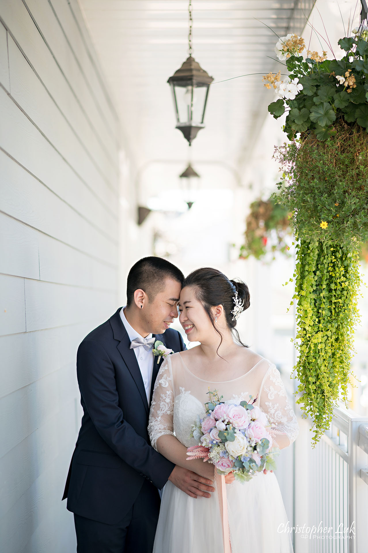 Christopher Luk Toronto Wedding Photographer The Doctor's House Chapel Kleinburg Natural Candid Photojournalistic Posed Bride Groom Hugging Holding Each Other Chandelier Hanging Plant Intimate Portrait Micro Microwedding 