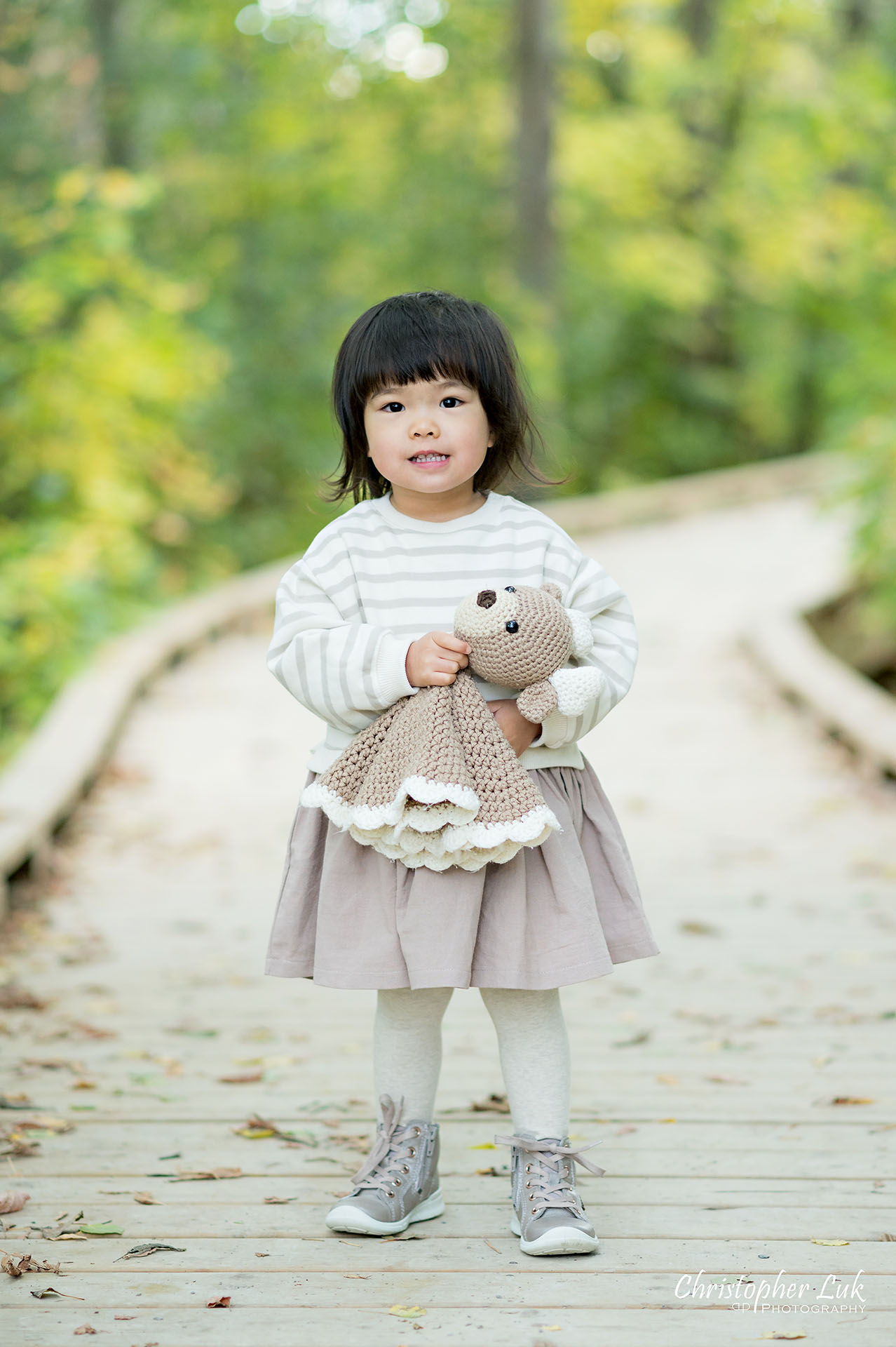 Christopher Luk Markham Family Photographer Autumn Leaves Fall Season Candid Photojournalistic Natural Bright Timeless Daughter Sister Stuffed Animal Smile