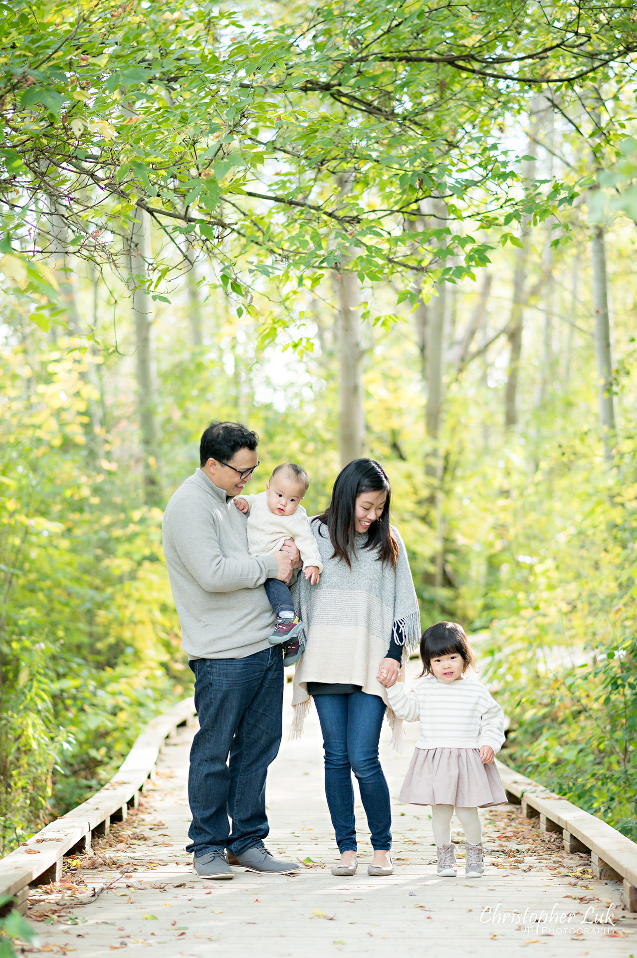 Christopher Luk Markham Family Photographer Autumn Leaves Fall Season Candid Photojournalistic Natural Bright Timeless Mother Father Son Daughter Smiling Portrait