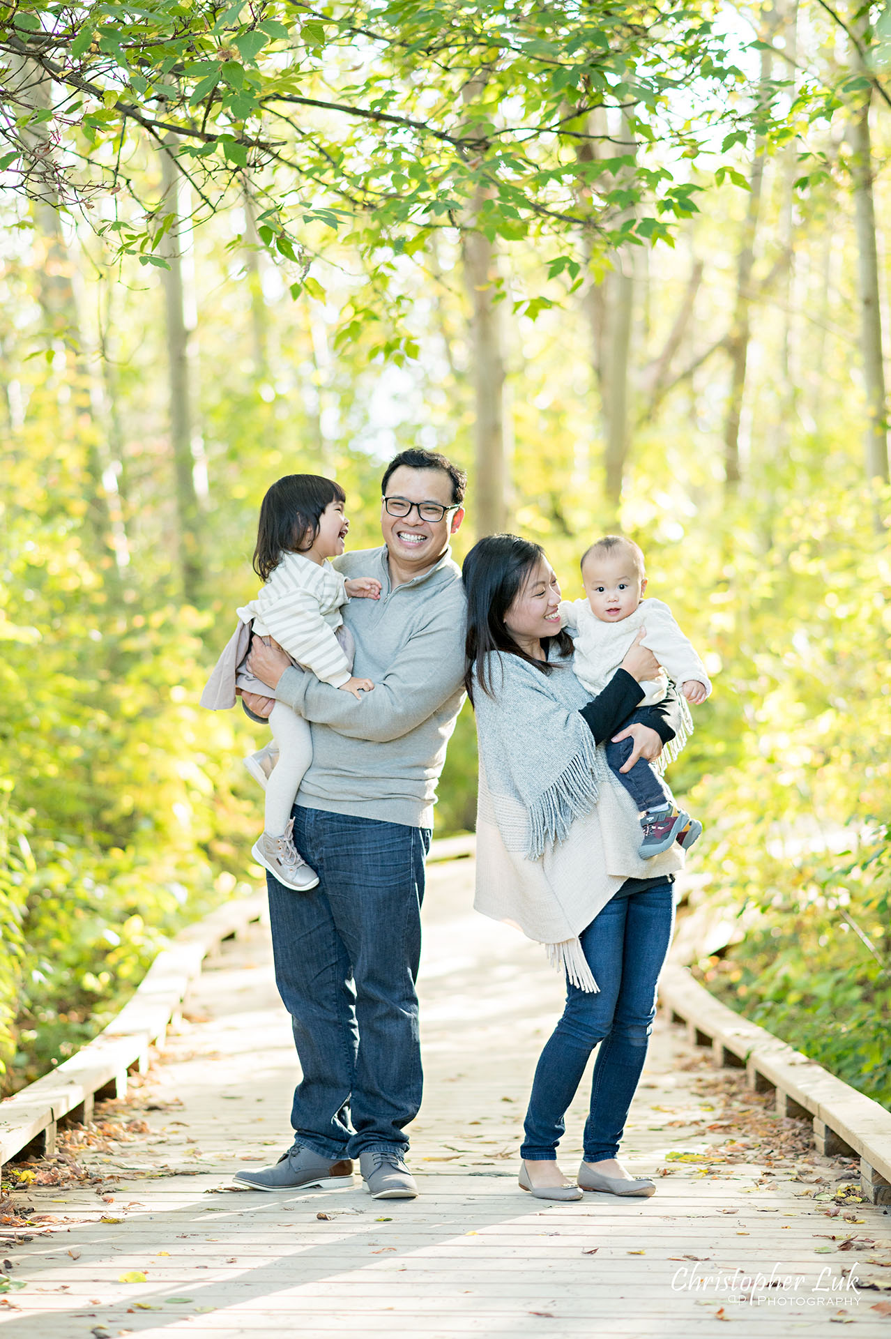 Christopher Luk Markham Family Photographer Autumn Leaves Fall Season Candid Photojournalistic Natural Bright Timeless Mother Father Son Daughter Smiling Laughing Portrait 