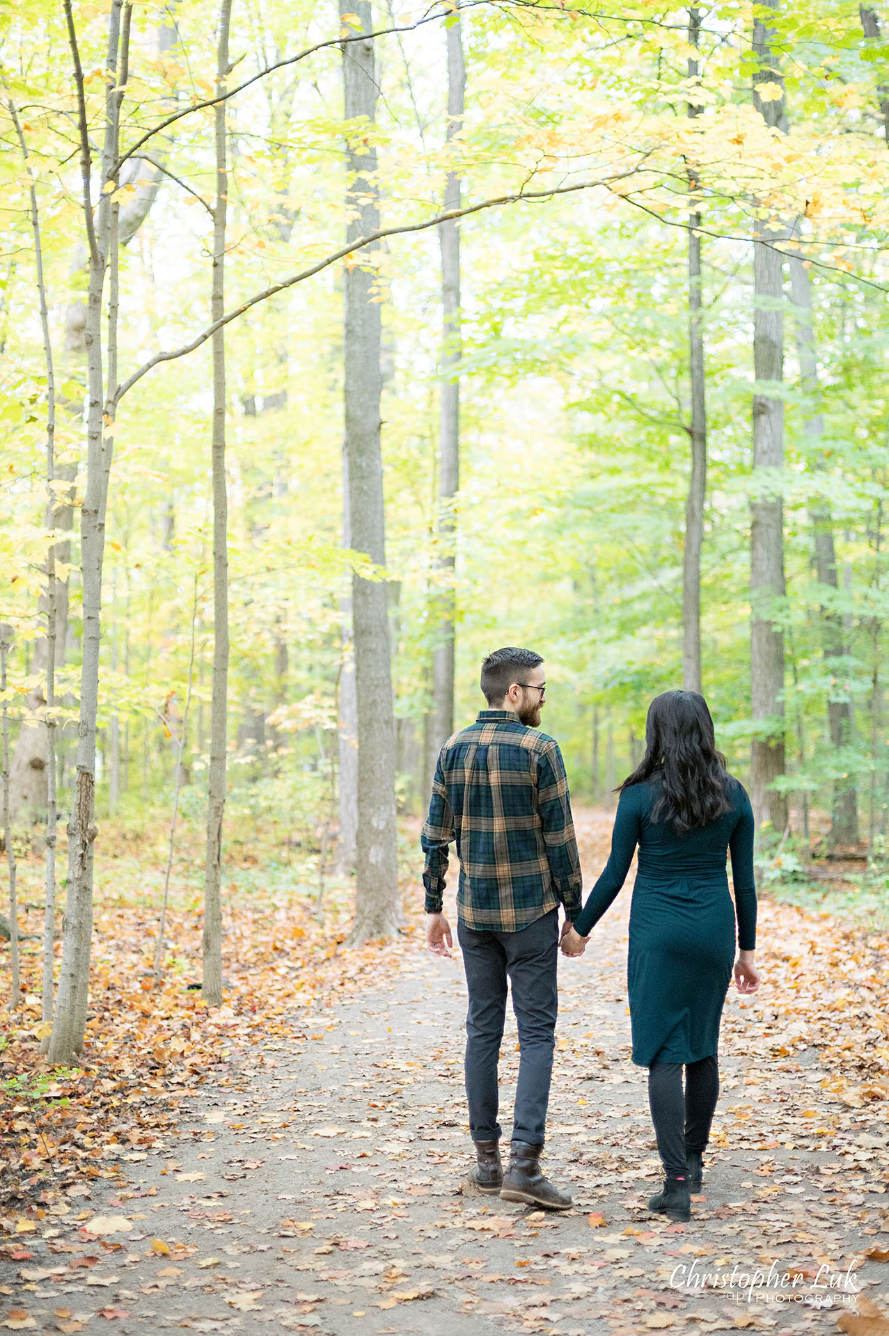 Markham Pregnancy Photos Pictures Toronto Maternity Photographer Mother Father Motherhood Fatherhood Baby Bump Candid Natural Photojournalistic Wooden Holding Hands Walking Together Forest Trail Fall Autumn Leaves Portrait