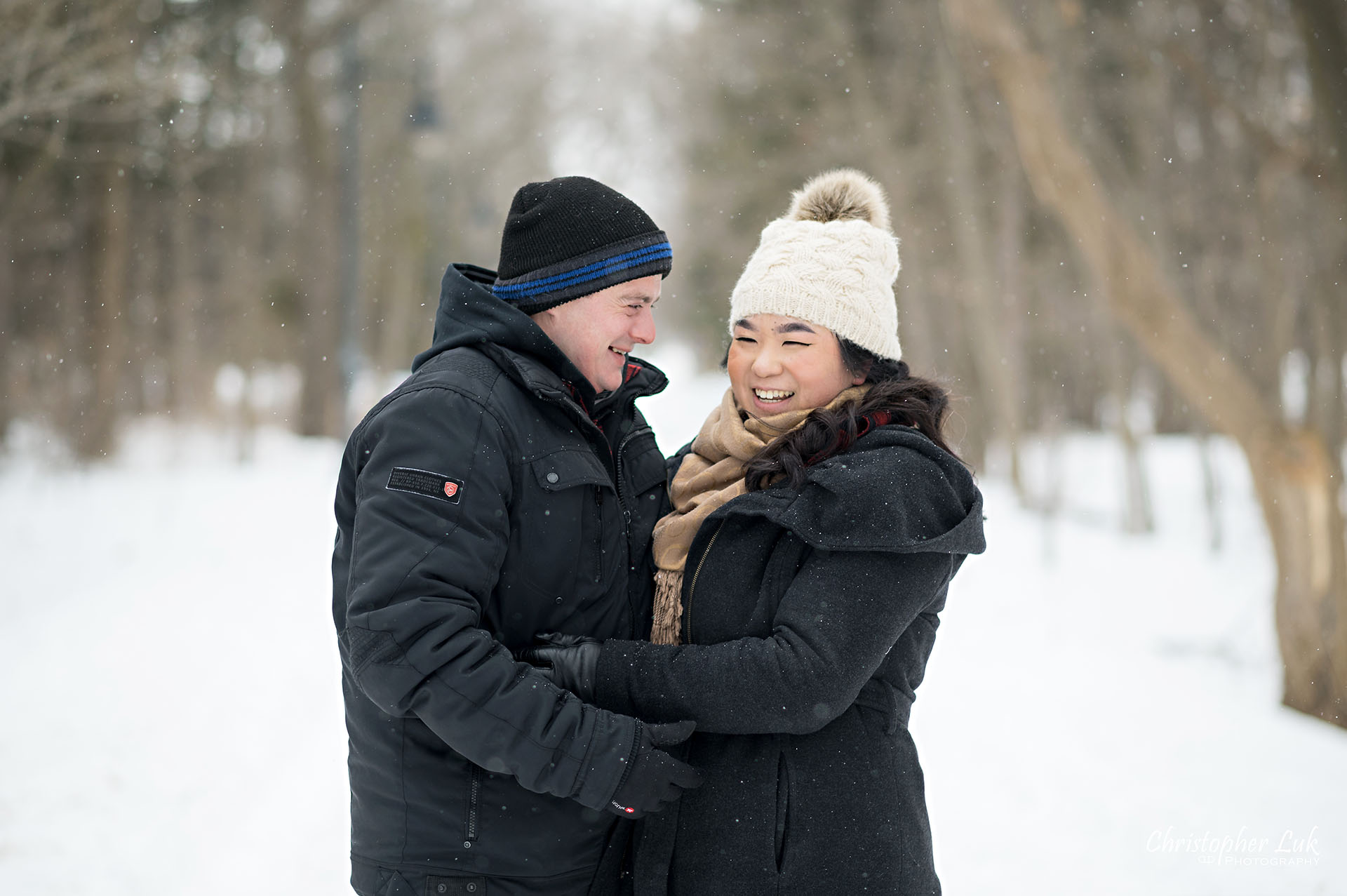 Christopher Luk Toronto Wedding Photographer Ice Skating Trail Winter Engagement Session Natural Photojournalistic Candid Bride Groom Portrait Colonel Samuel Smith Park Double Tree Lined Walking Path Pathway Walkway Landscape Funny Laughing