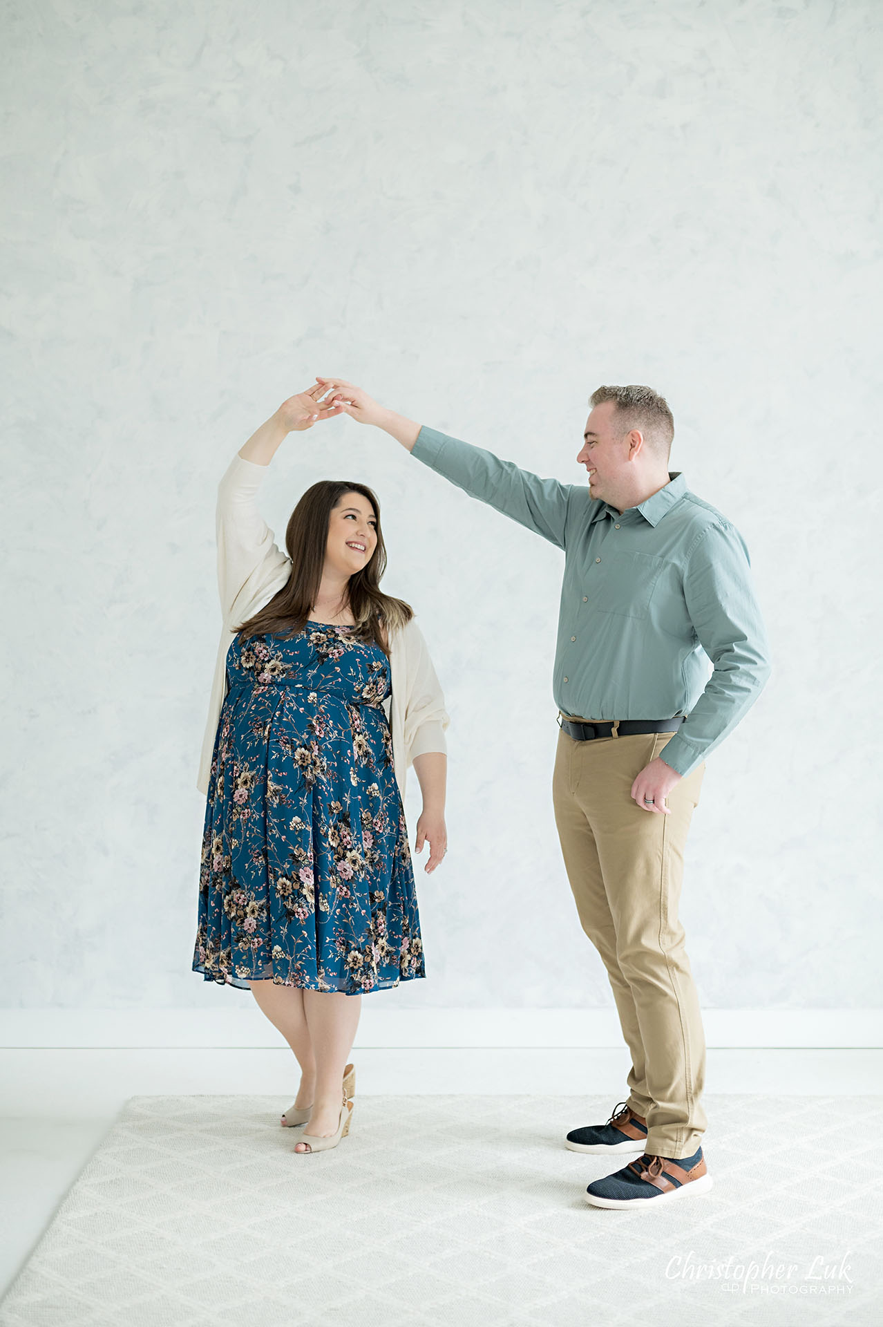 Christopher Luk Markham Pregnancy Photographer Maternity Sunday Photography Studio Candid Natural Organic Photojournalistic Mommy Daddy Mom Dad Baby Bump Dancing Twirling Spinning Fun Cute Adorable