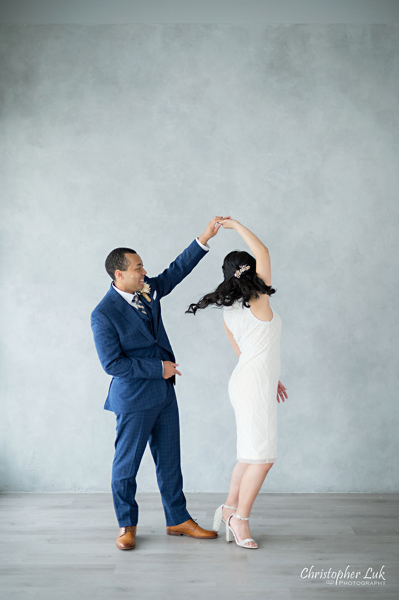 Christopher Luk Markham Wedding Photographer Linen and Love Studio Anniversary Session Bride Groom Portrait Natural Candid Organic Photojournalistic Dancing Spinning Twirling