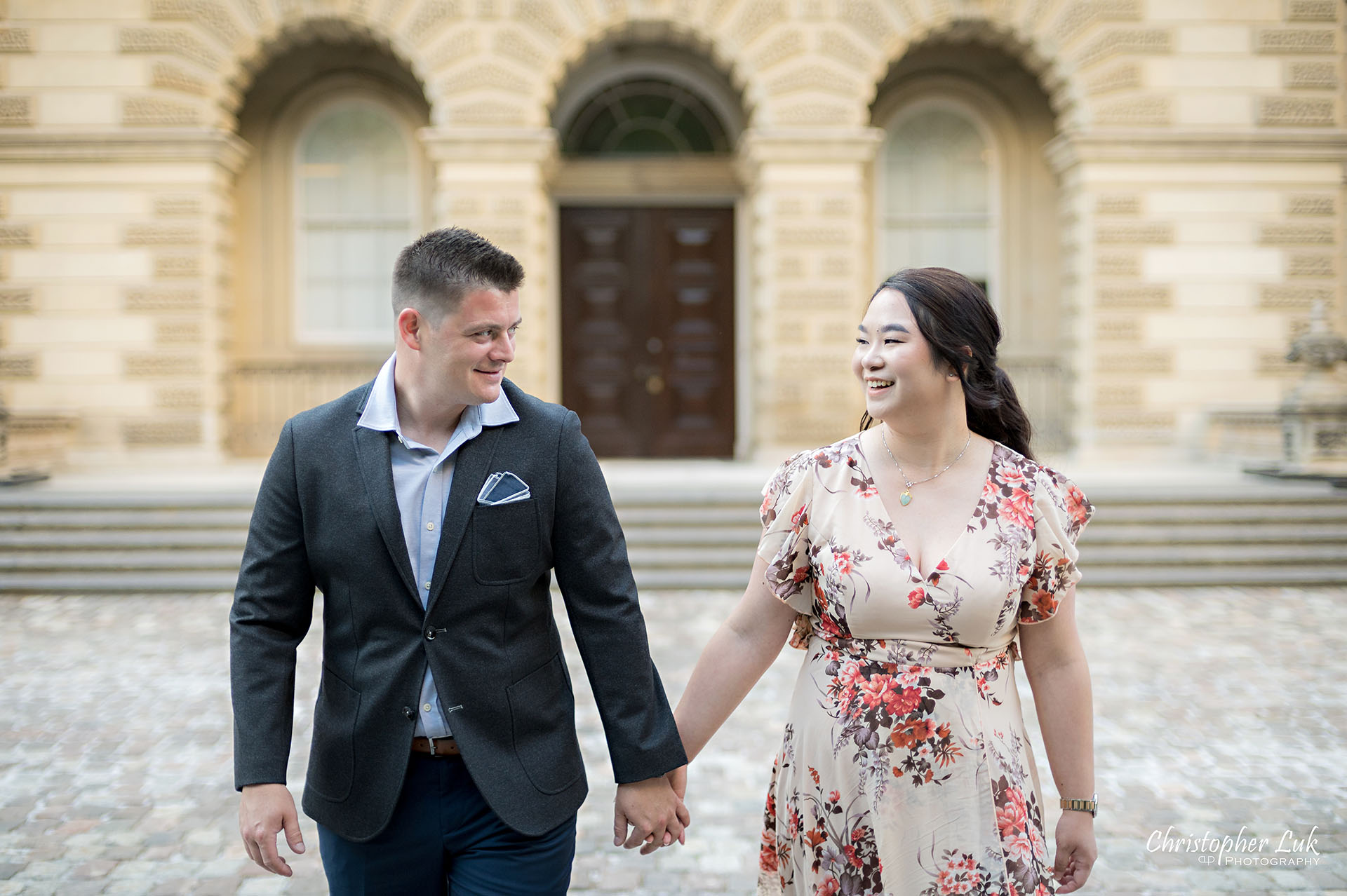 Christopher Luk Toronto Wedding Photographer Engagement Photos Pictures Session Osgoode Hall Nathan Philips Square City Hall Bride Groom Natural Candid Photojournalistic Organic Sunset Holding Hands Walking Together Landscape